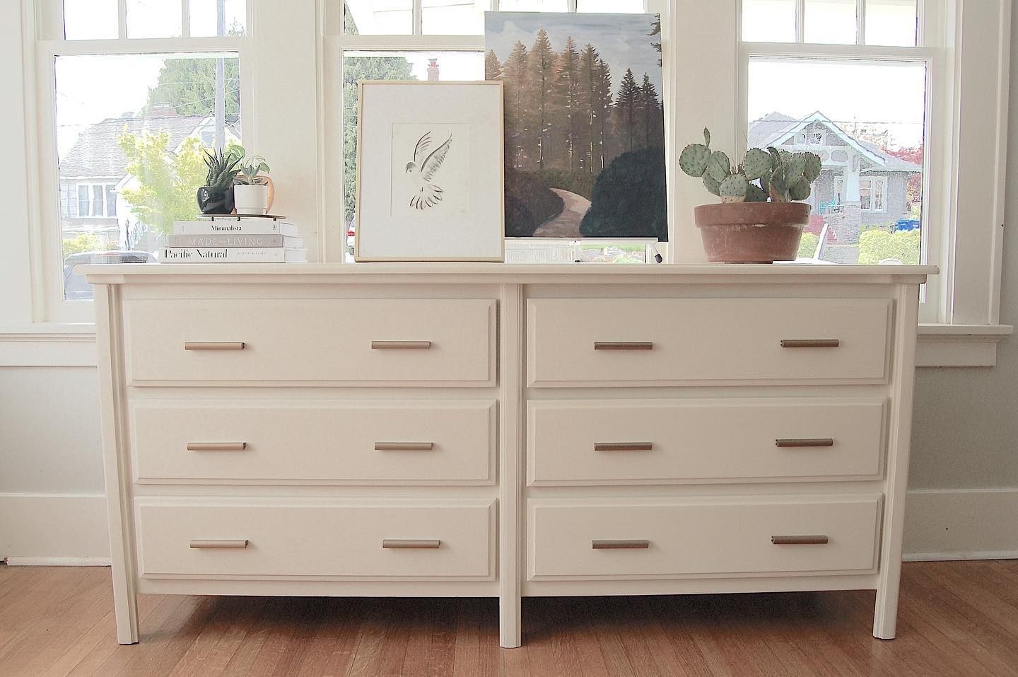 SOLD Modern and simple. Painted in my new favorite BM’s Creamy White with updated brass pulls. Swipe to see the before pics…there are two because I forgot to take a pic before I started demo and sanding…