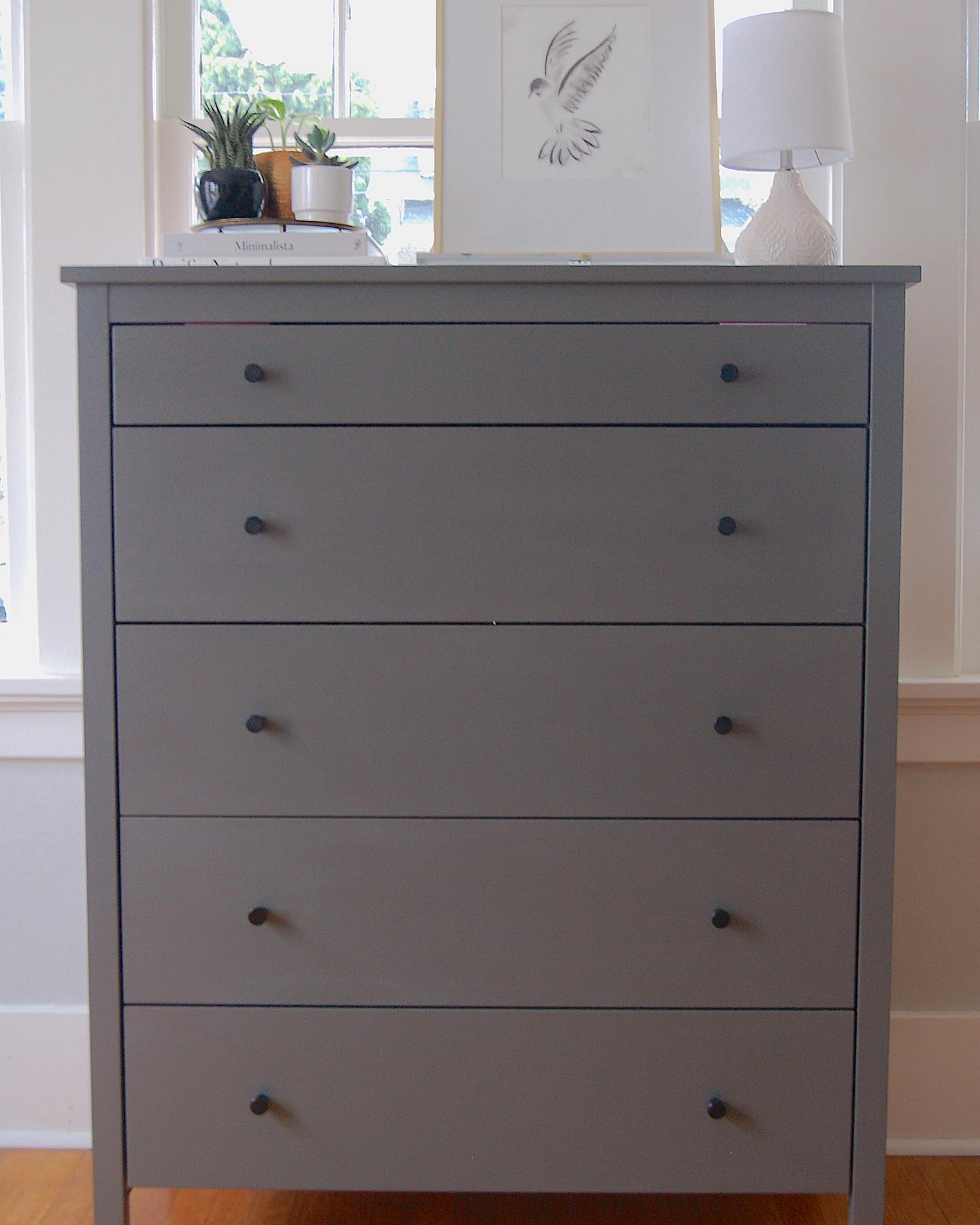 SOLD This was an outdated IKEA dresser that had seen a makeover before. Normally, I prefer to update older dressers but I knew this one could be super cute and needed my help. I painted it Kendall Charcoal by Benjamin Moore and updated the hardware to cute black knobs. ❤️ swipe for the before and see full story at rachaelannart.com