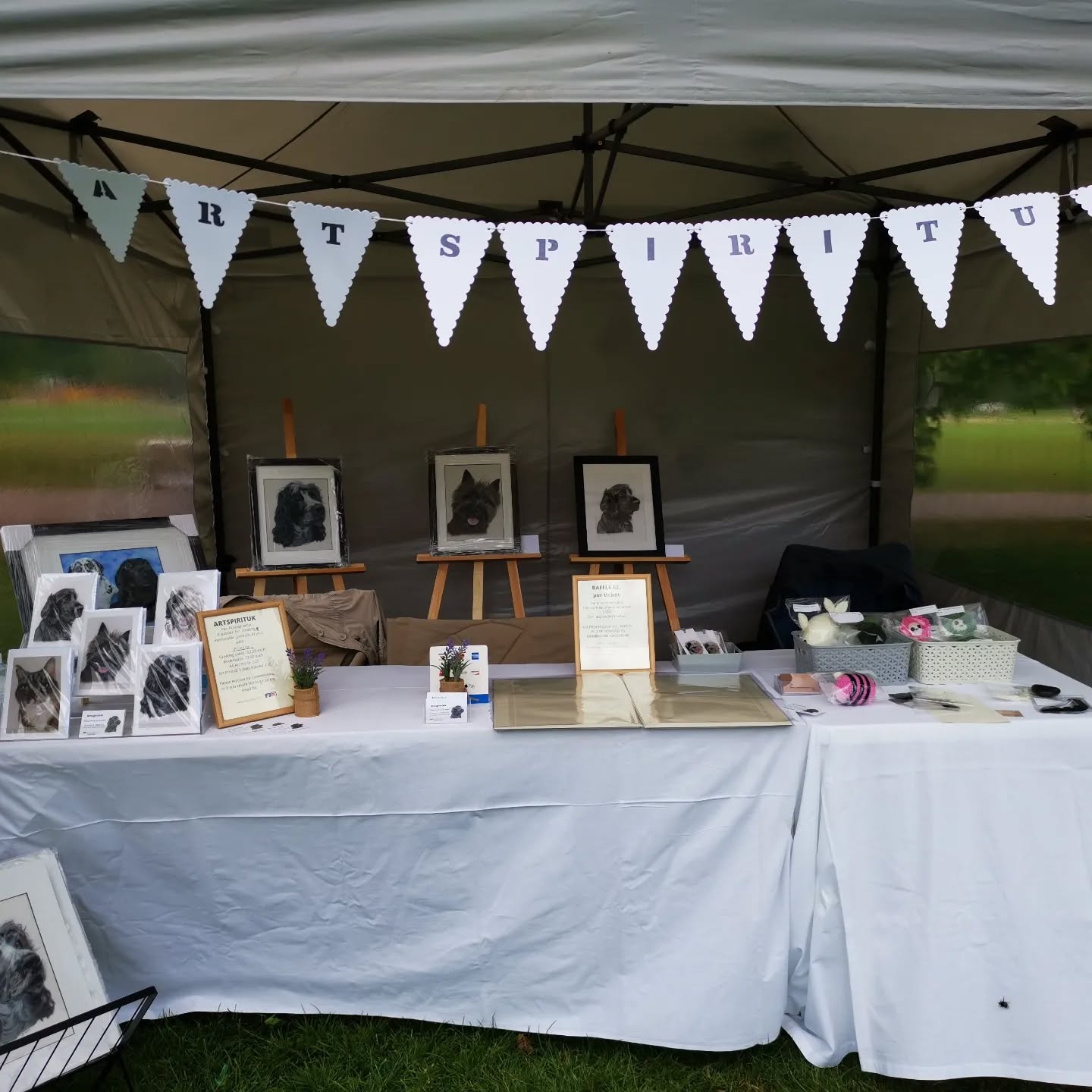 My very first art stall. It was amazing and created a raffle prize draw which was a free portrait to winner. Proceeds of the raffle went to the dogs home charity ❤️😀😀