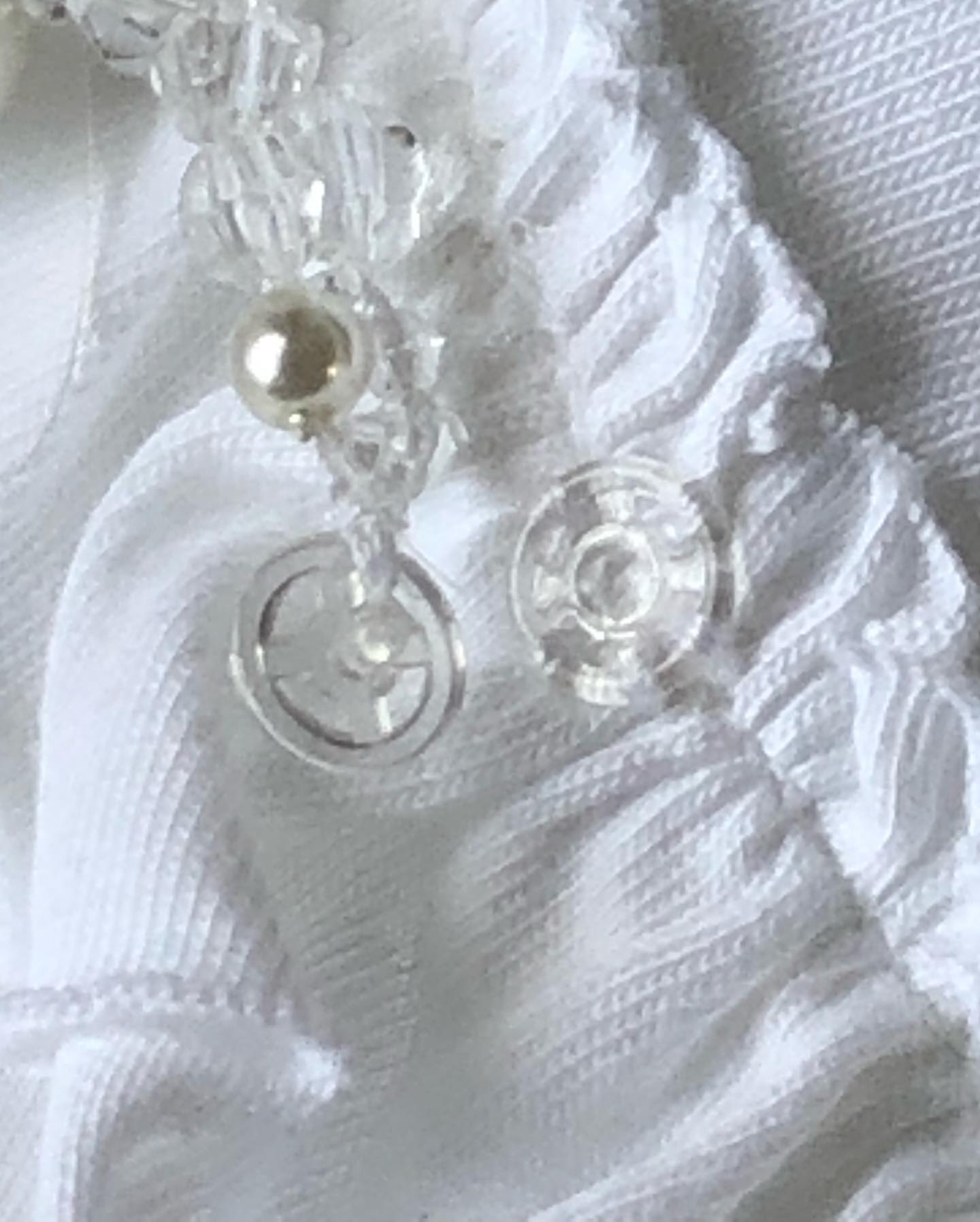 This solution, to make a beaded feature removable for cleaning, was a snap! #clearpoppers #clearsnaps #garmentamendments #beadeddresses #solutions #tailoringforwomen
