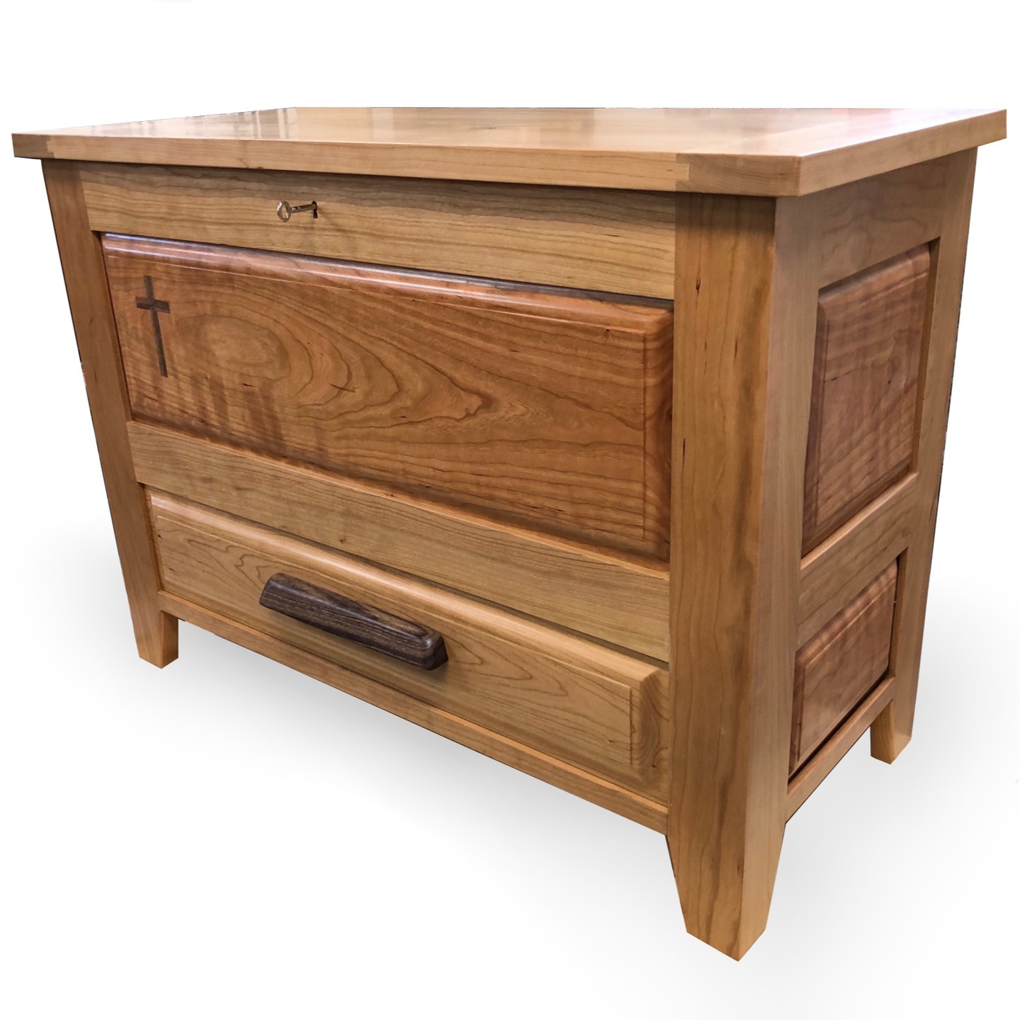 A design Dan and I worked on which evolved into this finished product. All Pennsylvania Cherry, grain matched along the top sides and front raised panels. Straight forward mortise and tenon frame, breadboard edge top(not without excitement) and a drawer with a secret lock. This was FUN!
Spring 2022 Hope Chest