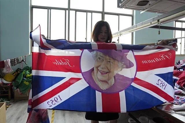 A crazy order for 500,000 British flags a week to be made at a factory in Zhejiang, China.