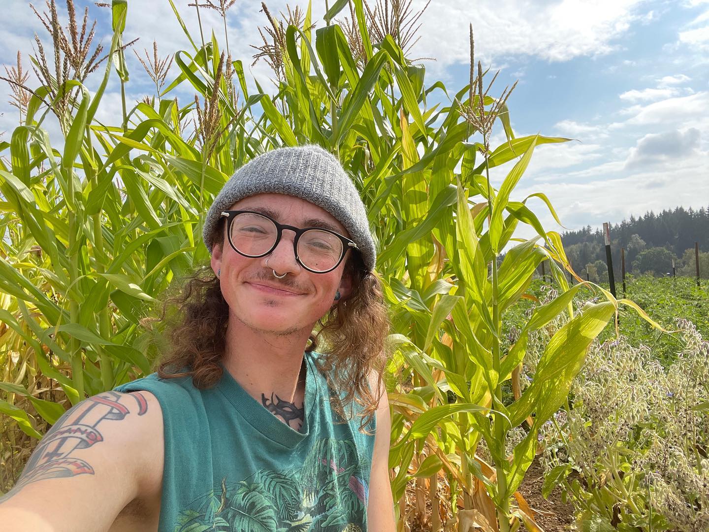 The 228th recipient is Dexter Collingwood @redcheckeredvans, a farm employee of Xast Sqit Farm @goodrainfarm in Oregon.
Dexter writes, “I feel like I started farming as the choices humanity has made have finally started crashing down around us. The climate crisis is honestly overwhelming, not to mention labor shortages and skyrocketing housing and land prices. Farming at Xast Sqit has brought a form of purpose to my life that I’m not sure I would have found otherwise. This work is so much more than just food, and especially as a white farmer, queer or not, I keep those who made this work possible close to my heart. Bringing people closer to the plants that their ancestors tended, and drawing closer to those that my own ancestors cared for is invaluable.
Support can take so many forms. During a season like 2022, I try to remind myself and the veteran farmers around me to celebrate the smallest victories. It is too easy to look backwards at all the years of abundance and mourn what could have been. Self care is letting the season take its course, accepting what you cannot change, and dissecting what you could have done better. We can’t expect ourselves to be indestructible. Be kind to yourselves, friends.”
#goodrainfarm #realfarmercare