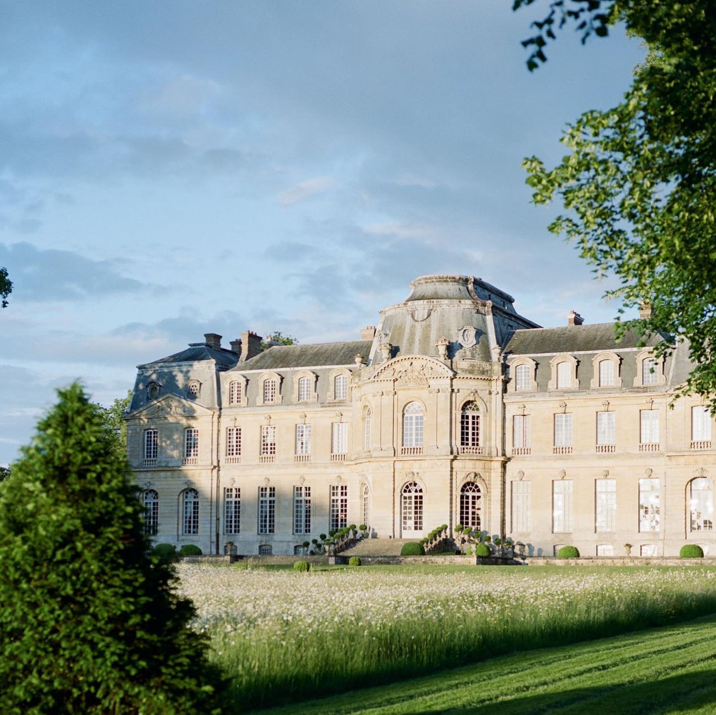 Designed by Jean-Michel Chevotet, the Château de Champlâtreux is finally completed in 1757. Its classic and majestic architecture was designed to host lavish events. It was built using wood from the neighboring forests, stone from local quarries and Chevotet had even created a brickyard in front of the château during its construction! @mollycarrphotography