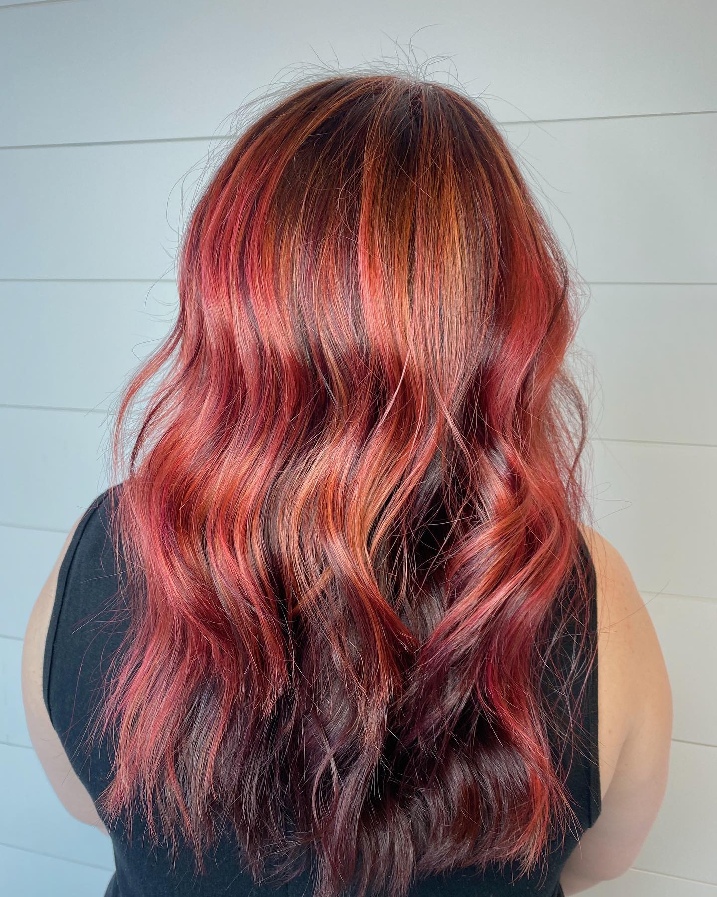 Beautiful bright reds 🍁 Click the link in our bio to schedule an appointment and refresh your look this Fall!