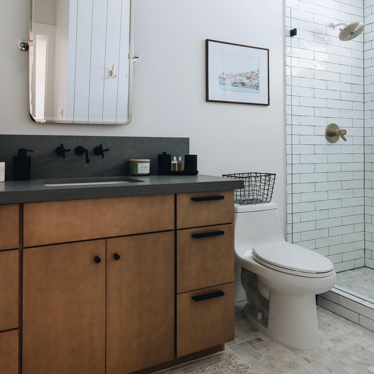 The warmth these cabinets bring to this bathroom is stunning 🤩 #bathroominsporation #woodcabinets #cabinetry