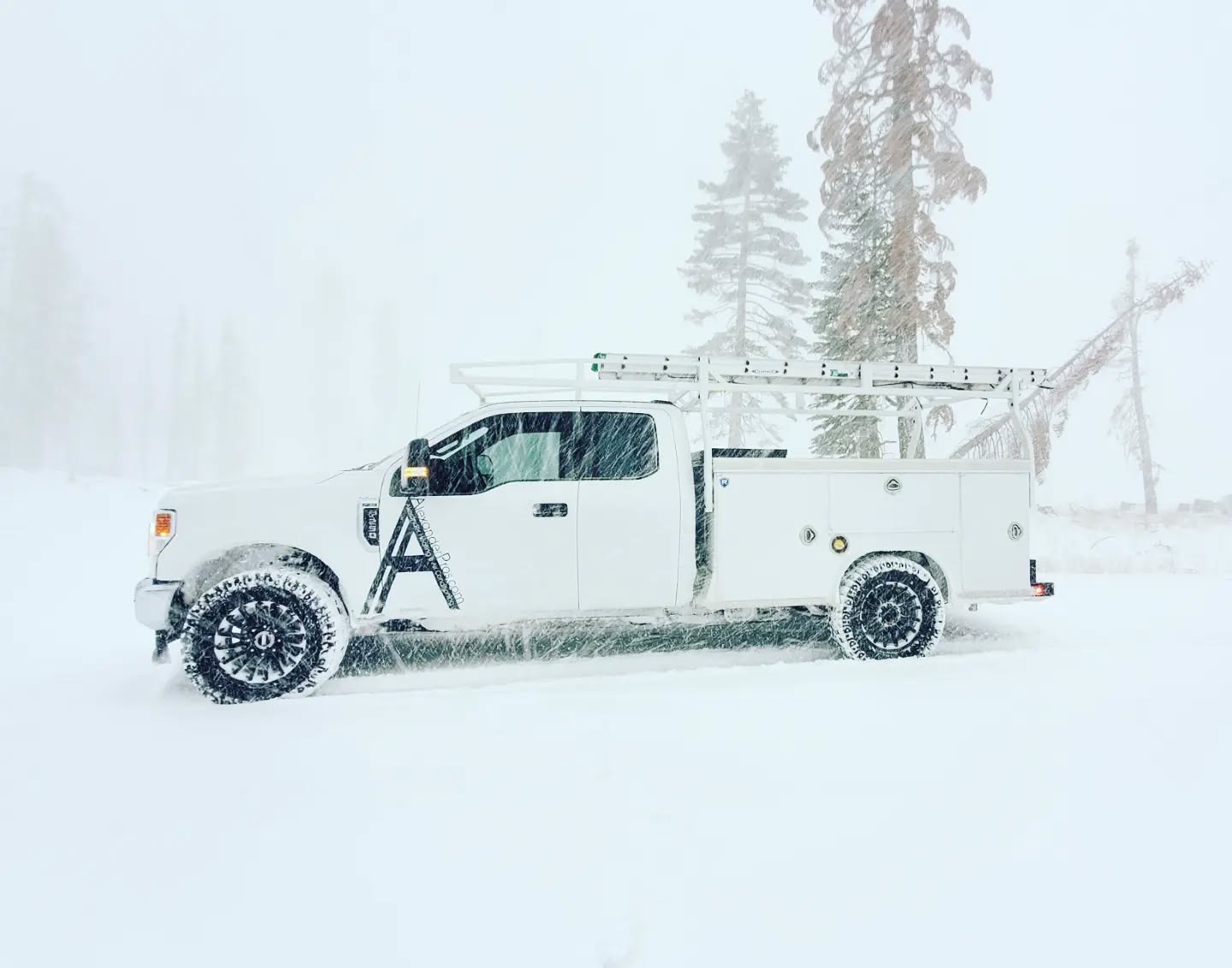 It's Snowing... got an amazing work truck, drives like a dream.