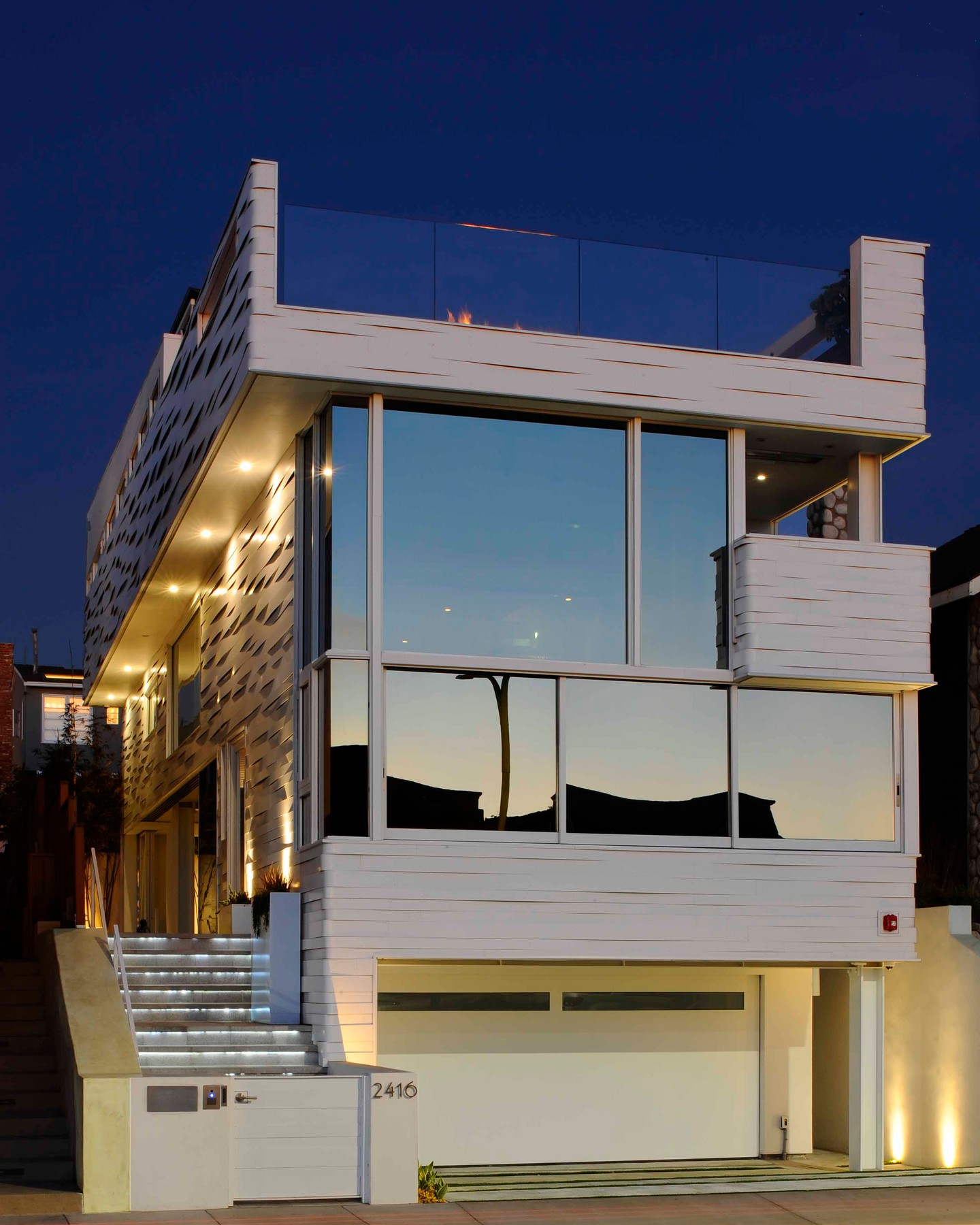 - Exterior/dusk -
House of Waves is a beachside retreat with all the amenities needed by a family that loves to entertain. We have maximized the open, airy feeling of the house with double-height spaces and open balconies that allow a view of the water from every room in the house. The custom skin, inspired by the nearby ocean, wraps the entire house. See more at https://www.sander-architects.com/hermosa-beach-house
.
.
.
#architecture #architect #design #construction #facadedesign #facade #architecturephotography #architecture_hunter #archdaily #nextarch #architecturelovers #facadelovers #home #homedesign #hybridhouse #hybridconstruction #residence #greenarchitecture #arquitetura #perspective #pattern #archlife #Losangeles #residentialarchitecture #waves #sanderarchitects #skin