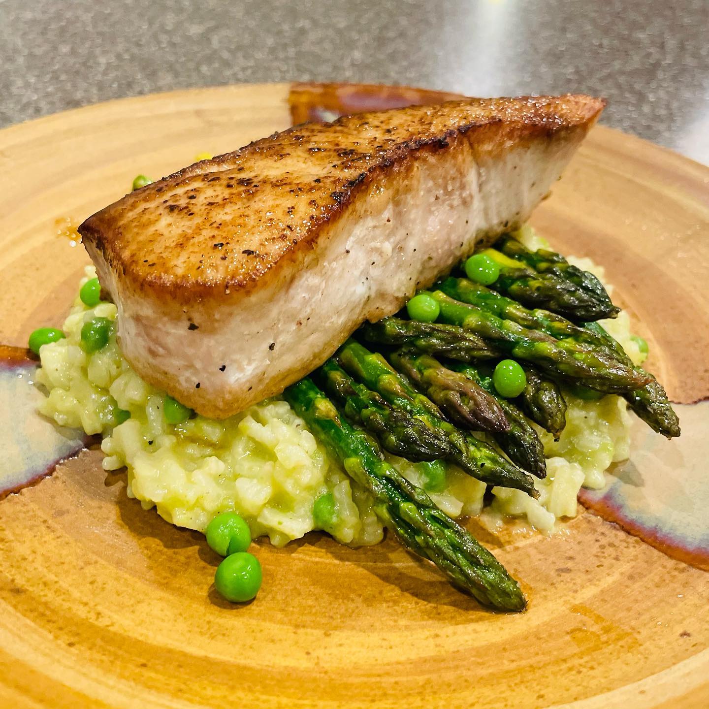 Pan seared Monchong with roasted asparagus over sweet pea risotto. Fish was from @saltwater_markets