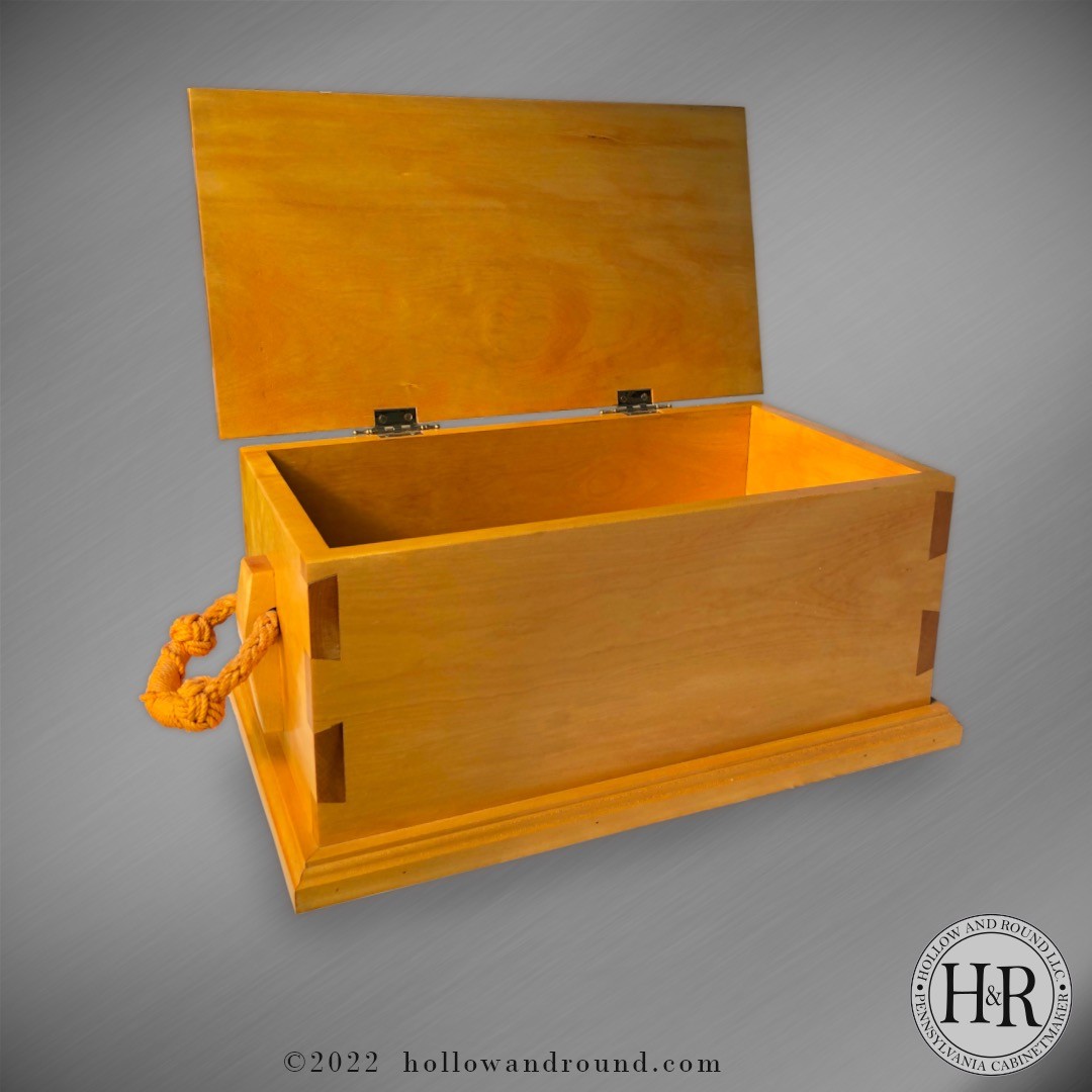 This is my example of a sea chest in Yellow Heart. Very hard wood, tough on chisels and planes. I designed and built this for my Navy retirement shadow box. I figured a sea chest would be fitting for a Destroyer CMC's retirement DDG 98. A few firsts here, very first attempt at dovetails, I know the spacing is too uniform, next time smaller pins but I focused on the technique over design. Following tradition inside is my Retirement Flag, flown over the HAS (hardened aircraft shelter) we worked out of in Iraq in "06", medals, rank insignias, a few arming wires from missions during OIF deployment in CVN 71 in "03", another flag from one of the last bombing missions of that deployment and some documents that may tell a story some day. All well preserved in a heavy, poorly spaced dovetailed chest.
