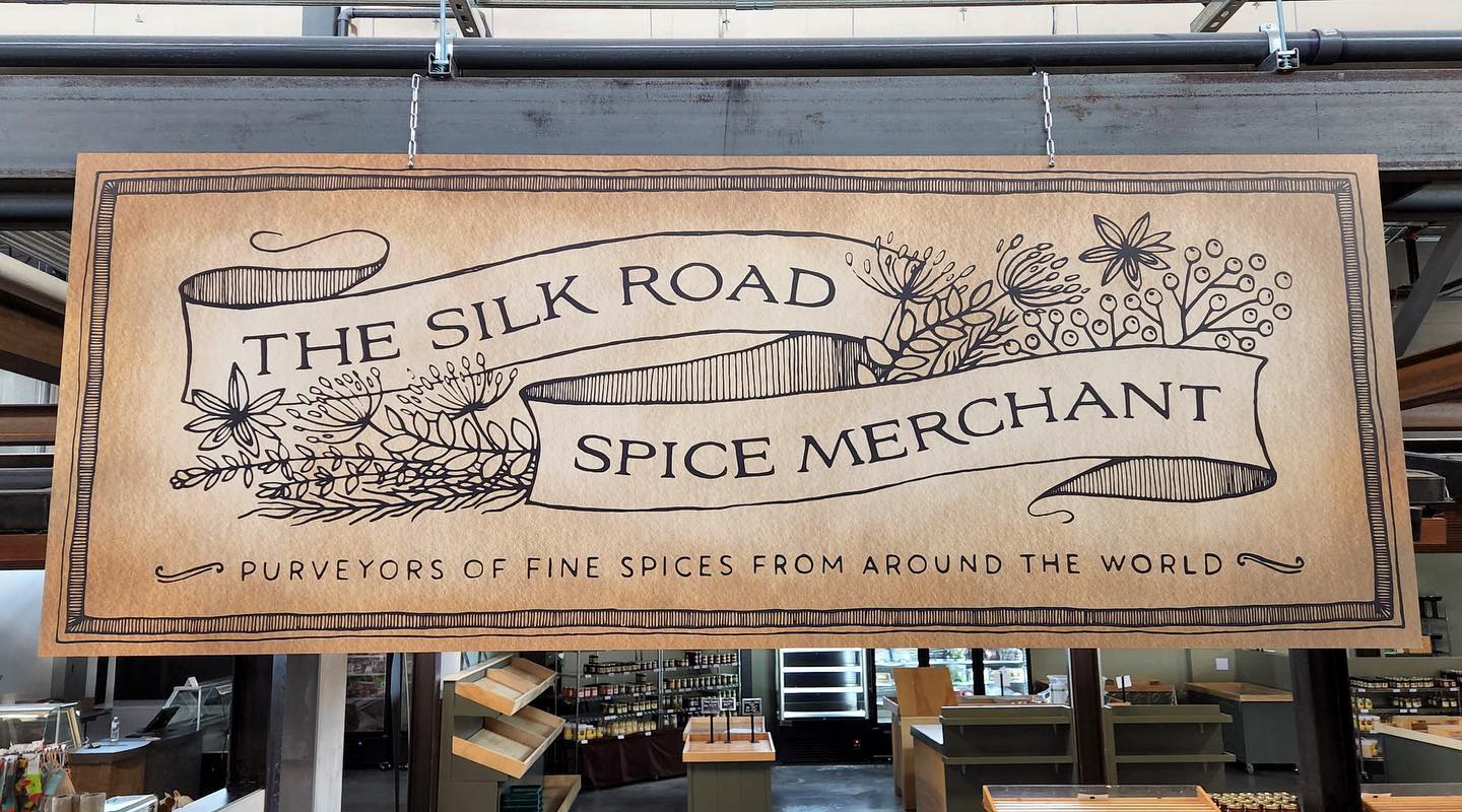 The sign I illustrated for The Silk Road Spice Merchant’s booth at The Calgary Farmers’ Market - West, in context.
Thanks for the photo @lateral.view