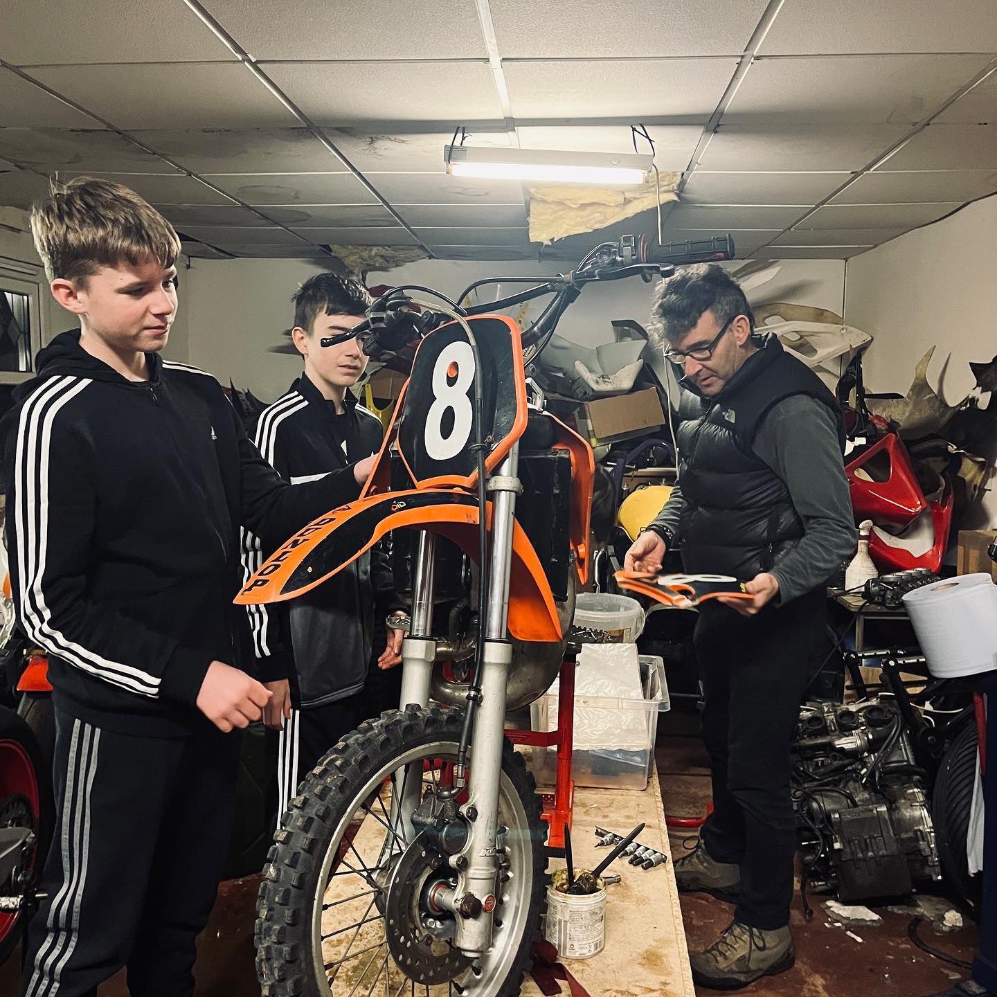 Our last Friday night of 2022 and the lads are hard at work in the workshop rebuilding the KTM.
