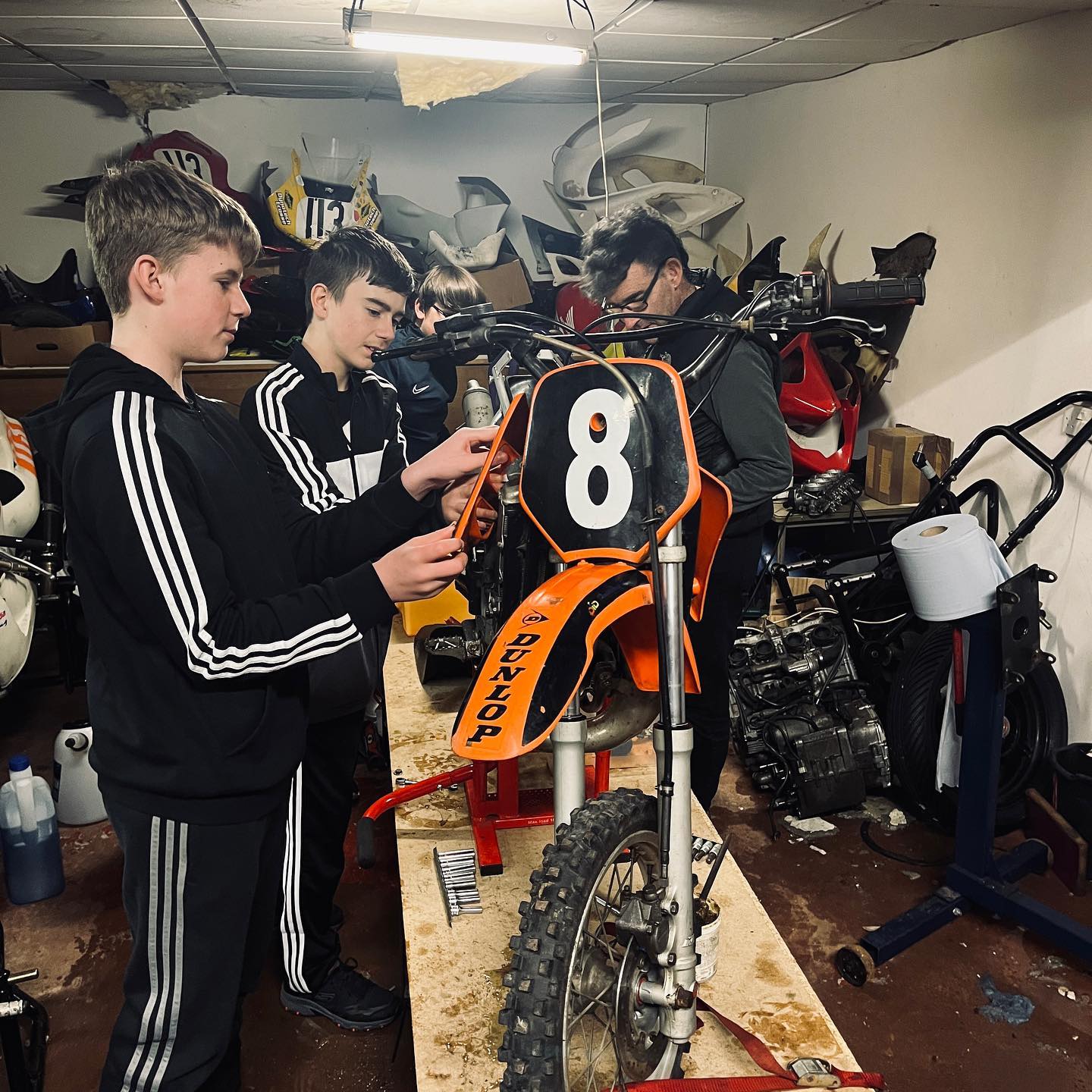 Our last Friday night of 2022 and the lads are hard at work in the workshop rebuilding the KTM.