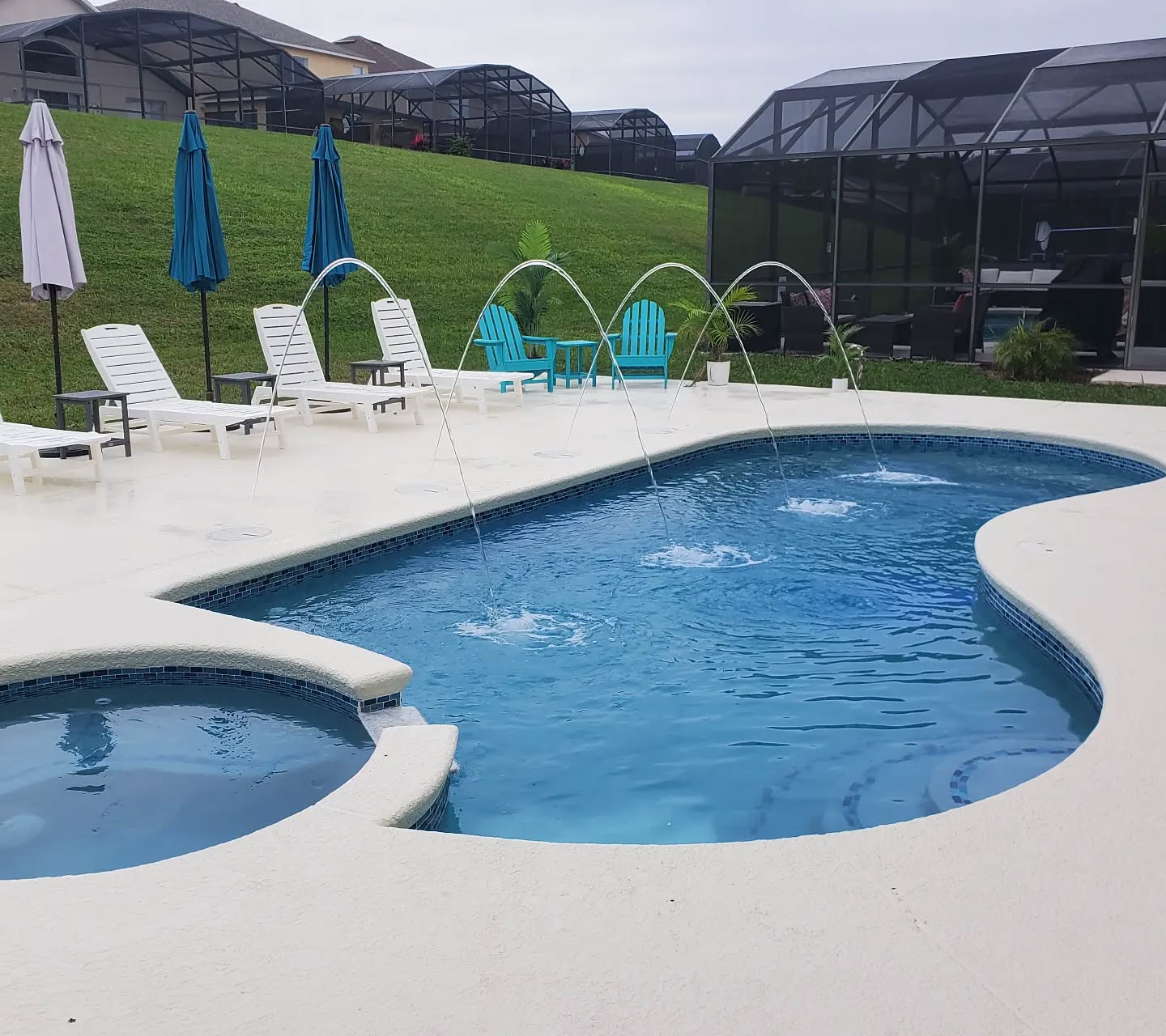 LED lights and laminars added on this pool renovation! Resurface and glass tiles.
