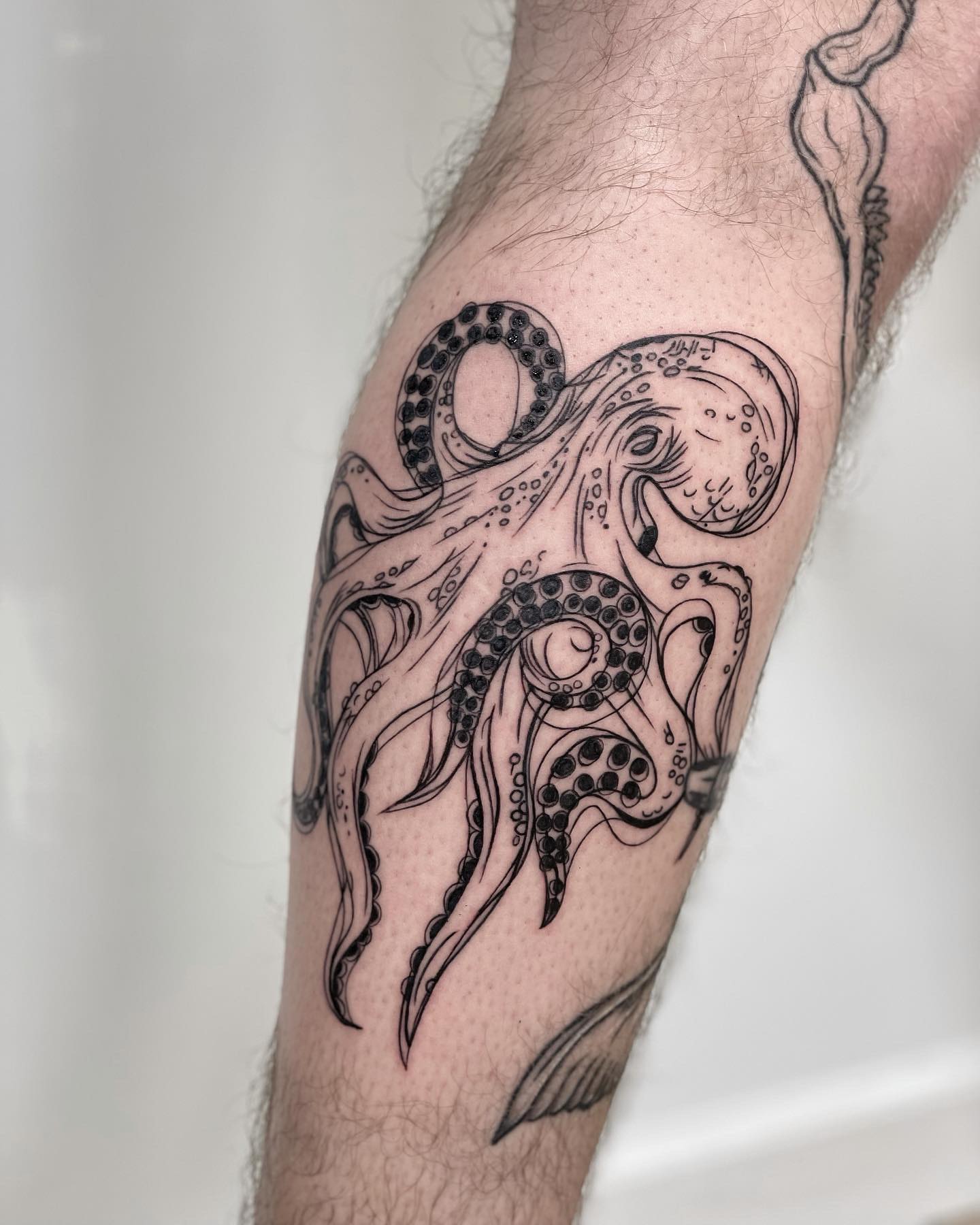 Line work on this octopus done by @kys_ink