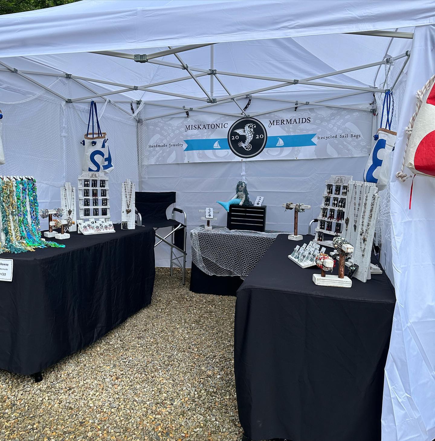 We are here @saludaartsfestival ! Come by and check us out! Handmade jewelry for mermaids! We are located by Saluda Rentals NC. #saludancartsfestival #miskatonicmermaids #handmadejewelry #mermaids #sailbags #sails #saludanc