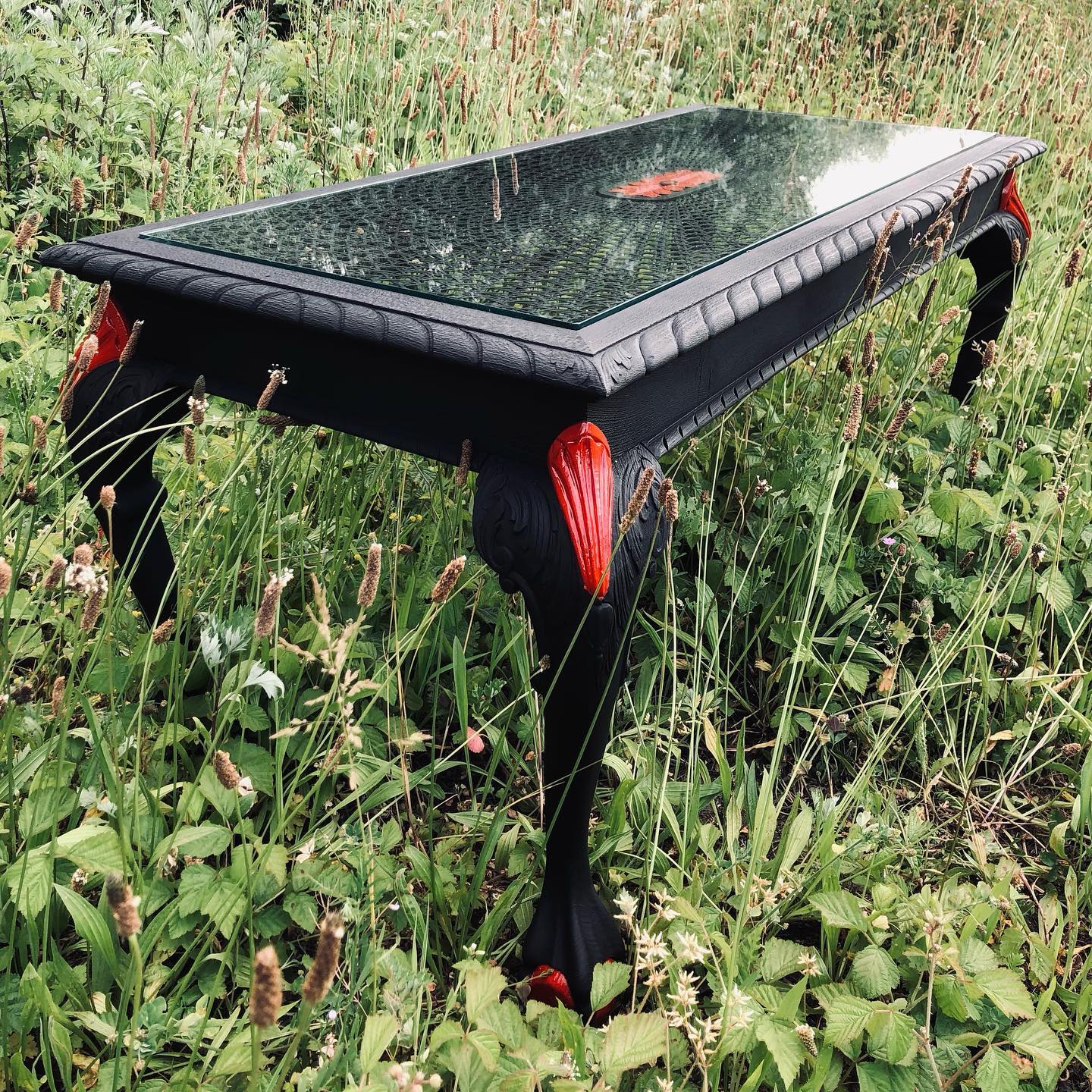 > more upcycling!
Here’s another nice little side-hustle.
This Solid french oak vortex table has been sandblasted to bring out the beautiful wood grain, and my first idea was to finish the piece with a natural colourless oil. But once the original naked wood was visible this table turned out to be very stained through the test of time. Life is about improvising, so I decided to finish the piece with a charred matte black color, in contrast with some bright reds to highlight the handmade sculptures.
I’m pretty happy with the end result.
What do you think?
It’s pretty poignant to see how much raw materials bursting with character this world is throwing away, just to buy something ‘(n)ew’, mostly inanimate, soulless and mass produced. It’s blatant and even somewhat abhorrent.
At Lowie Catorze headquarters we love to make a change and are always on the lookout to collect those beautiful second hand resources and give them a descent new life. It takes courage, respect, perseverance and definately an investment of time to convert these natural beauty’s into new, everlasting items of enjoyment.
Nevertheless, we love it!
Be the change you want to see.
#design #oldbutnew #recycle #fresh #furniture #upcycle #woodworking #handmade #paintjob #change #lion #pieceunique #sidehustle #detail #closeup #texture #oak #structures #redo #naked #remix #frenchoak #table #red #charred #bethechange #abhorrent #maker #extrememakeover #makersgonnamake