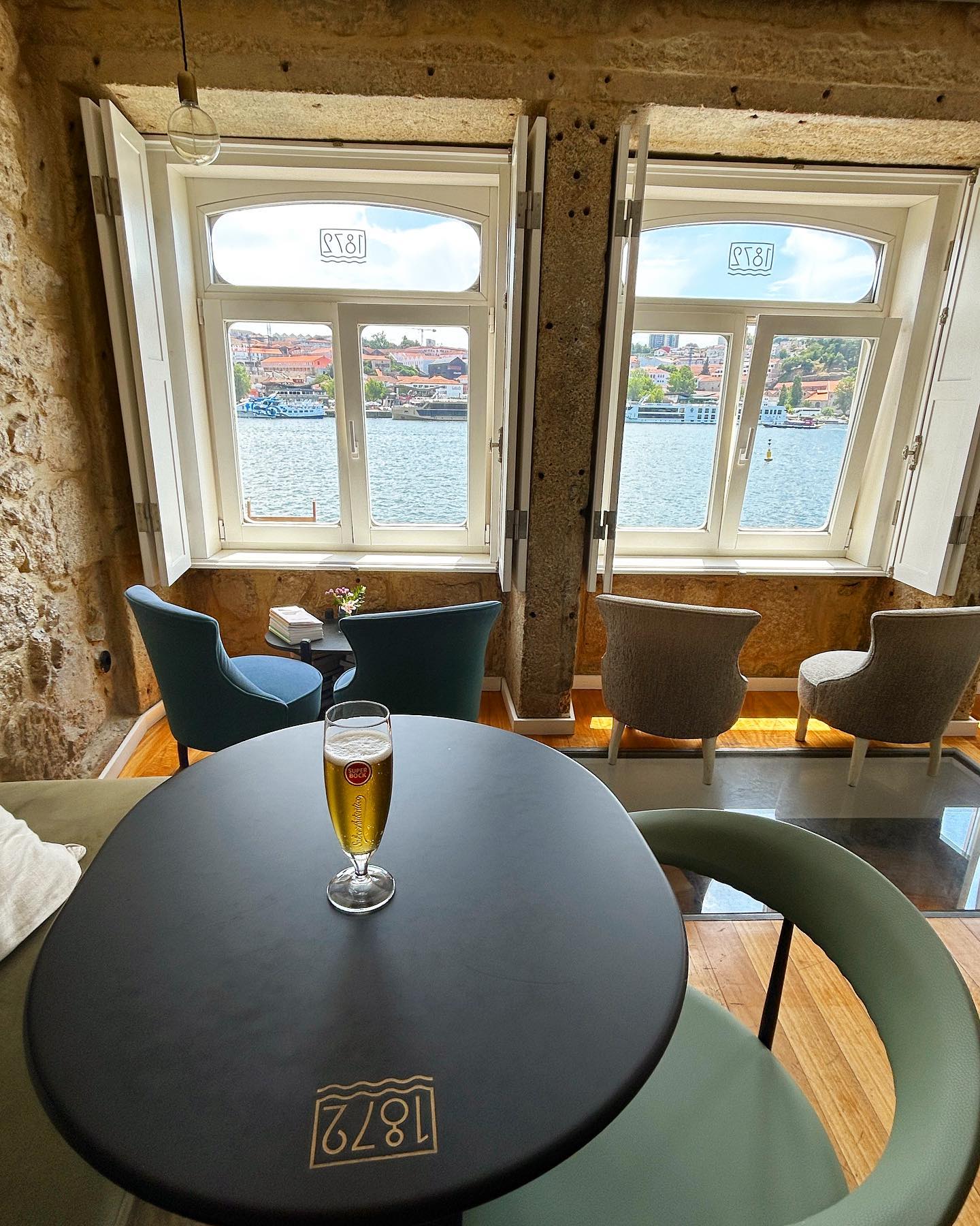 Final drink 🍺 in our favourite European hotel. @1872riverhouse Porto. The cries of seagulls, the chugging river boats, and that view!! We will be back for sure. 💕