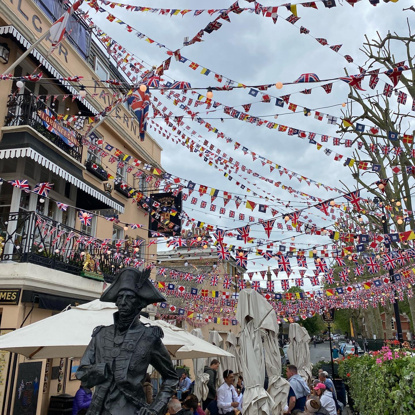 It’s been a good year in Britain if you like flags. They’re up everywhere. Lots of Royal events. Lots of pomp and circumstance. It’s all a bit odd because we’re all usually a little embarrassed to be British. Still, it’s not every year you get a new king.
Here we have photos of Nelson and flag bunting outside the Trafalgar Tavern in Greenwich, more bunting inside the tavern, flags and bunting down Eton high street, flags on the Mall walking away from Buckingham Palace and the rarely spotted (this year) royal standard flying over the Drum Tower at Windsor Castle.
•
•
•
Hello. I’m William Harry Mitchell, a Blue Badge Tourist Guide and Historical Interpreter. I lead tours around London and all over England. Want a tour? Have a look at my website (link in bio) for some ideas and get in touch through the contact form. @whmtours
#flags #bunting #pompandcircumstance #celbration #corination #nelson #trafalgar #pubs #2023 #history #exploring #windsorcastle #greenwhich #eton #buckinghampalace #tours #tourguide #touristguide #bluebadgeguide