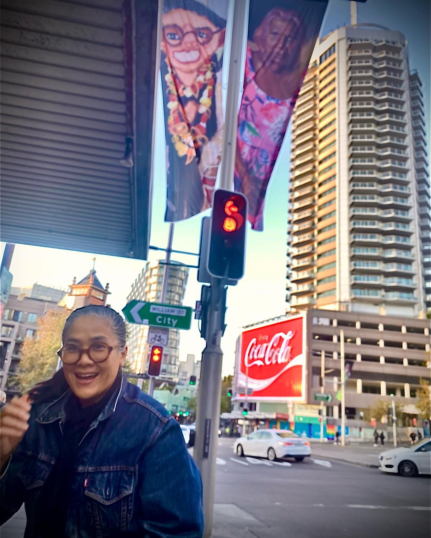 Kylie Kwong caught walking beneath“her”painting flapping in the afternoon Kings X light.
Catherine McGuiness, Archibald Prize 2023 finalist, portrait of KK Titled ‘Lucky’ Catherine, StudioA(a social enterprise that works with artists with intellectual disabilities)”I’ve painted Kylie wearing her favourite necklace & her round glasses. She always wears black. The words Lucky ...refer to Kylie’s special restaurant & memory of her son/She’s a lovely person” McGuiness said (SMH) Along with @kylie_kwong insta posts etc read of great joy between artist & subject.
KK, well known to Aussies, chef, restaurateur, author & TV . Recently honoured AO. A kind & generous chef, a true star shining brightness onto dimmer yet worthwhile enterprises & projects. A woman using her superpowers to support others in their community shaping, Rossana Barbaro @AddiRoad, Aunty Beryl Van-Oploo to name just two.
“Community, collaboration & connecting with people through food is what motivates me. When we lean into community, the focus on ‘I’ and ‘me’ shifts to ‘us’ and ‘we’. Within this space, we experience the very best of humanity.” (K.K)
KK a true #foodjewel💎s true food thinking. ✅ sustainable businesses practices early on, leading by e.g. “We now use only organic & biodynamic fruit & veg, poultry, meat & noodles. All the soy sauces, sugar, vinegar & oils we flavour our food with are organic, & we serve FairTrade tea, coffee & chocolate.” (KK 2005)
She has supported community organisations & new projects many less visible undercurrents, whilst out in the world conversing with the likes of René Redzepi, NOMA. KK gently brings attention to indigenous foods, careful not to appropriate, rather to support eg #sobah Platforming & acknowledging First Nation knowledge holders like Clarence Stocklee & Aunty Beryl. Her voice in worldwide discourse on food security whilst efficiently running a modest luncheon restaurant nestled into Sth Eveleigh Precinct & community. Always heralding relationships. It takes courage with a celebrity profile to speak out. Others on their ethical trajectories may fade but KK is consistently refining her message values woven with ‘heart & soul’