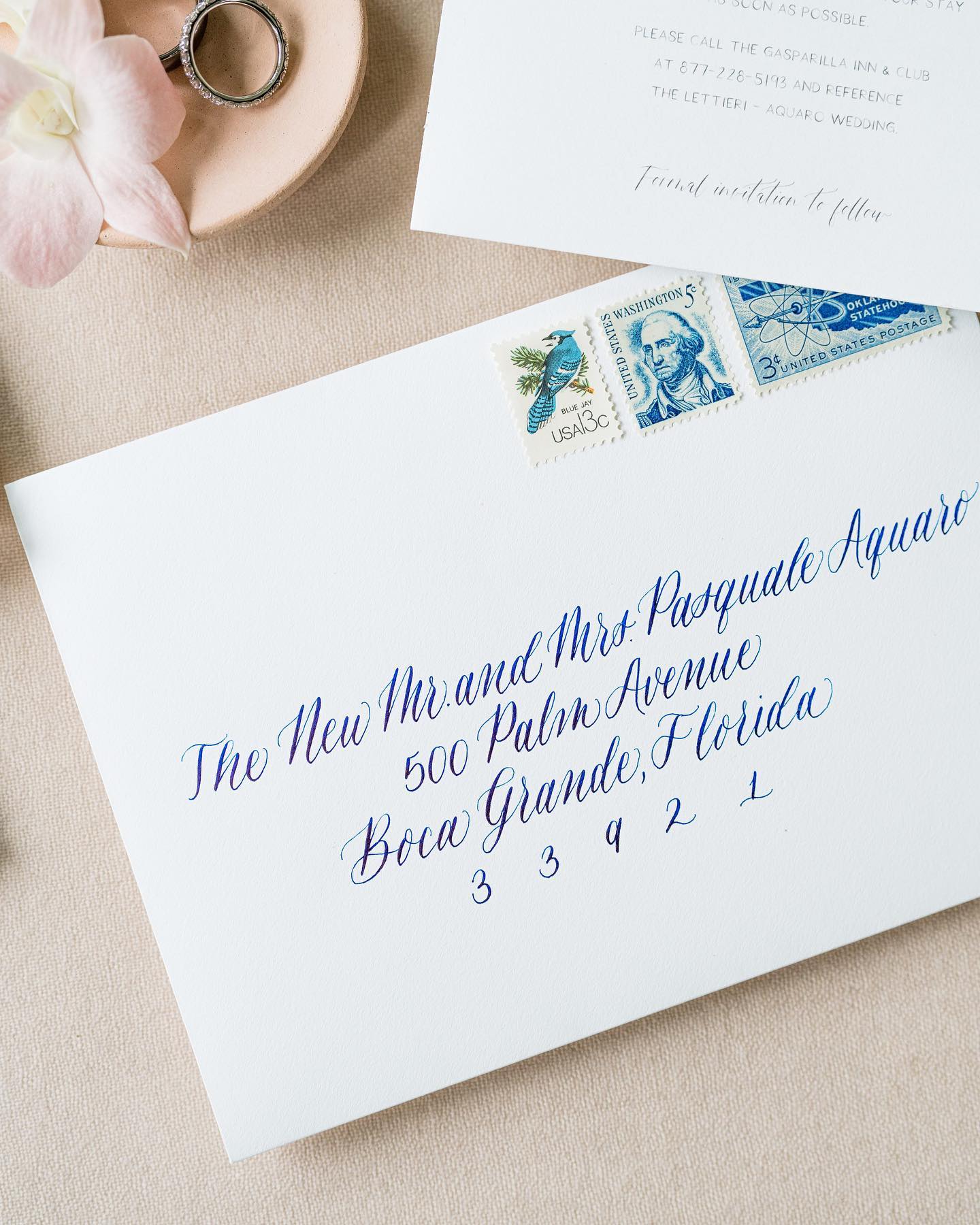 When your invitations feel like vacation 🩵
Many dark ink colors (like dark green, burgundy, and this example in navy) create a beautiful variation as I write and the ink begins to run out. It creates a watercolor-like effect and adds a whole other dimension of artistry. You can’t get that from a printer! If you have white or ivory envelopes and aren’t afraid of color - this is the way to go! 😍
This style coordinated perfectly with the invitation suite designed by @handpaintedweddings, featuring her gorgeous artwork, for Jaime & Pasquale’s Boca Grande wedding! 🌴 Congrats to the Aquaros!
Invitations: @handpaintedweddings
Photo: @laurengallowayphotography
#allicatcalligraphy #weddingcalligraphy #phillyinlove #phillycalligrapher #southjerseycalligrapher #phillywedding #jerseyshorewedding #southjerseywedding #calligraphy #pennsylvaniaweddings #destinationwedding #envelopecalligraphy #weddinginvitations #weddingstationery #phillystationer #bespokeinvitations #phillyweddinginvitations #custominvitations
