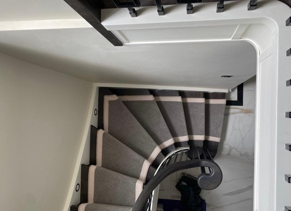 Abingdon Wilton Royal Charter carpet in Silver Shadow edged with Jasmine White to create a contrasting border and a reverse of the main carpet in our previous post