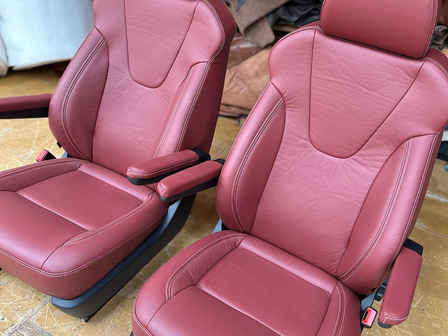 Leather seats burgundy with grey stitch, with our premium sport conversion foam upgrade to the back rests.