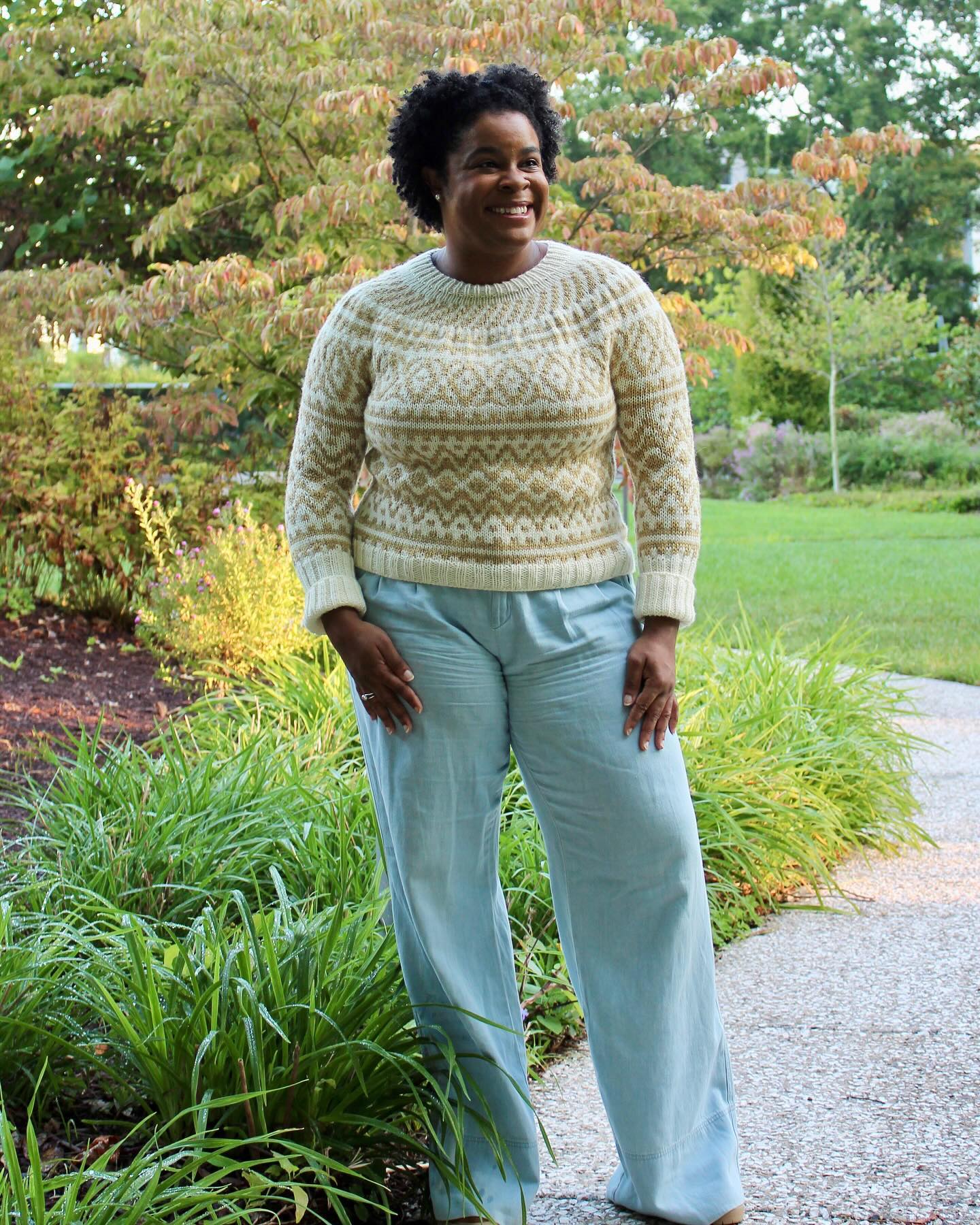 🤍 Cream Groovy🤍
My second #groovygenser sample is the most neutral of them all! I wanted to make a version that could also be a holiday sweater, and found two perfect colors from @camelliafibercompany in their Merino Worsted Base - “Moonflower” and “Ochre.” To top it off and add a bit of sparkle, I held a strand of gold stellina with the Ochre.
This version of the Groovy Genser features the standard rib neckline, standard body length, and elongated sleeve cuffs for those chilly days during the holiday season.
I have two more samples and their details to share with you over the coming days, but if you want more info on this pattern and to grab one yourself, check the link in my bio or head over to Ravelry! 🧶