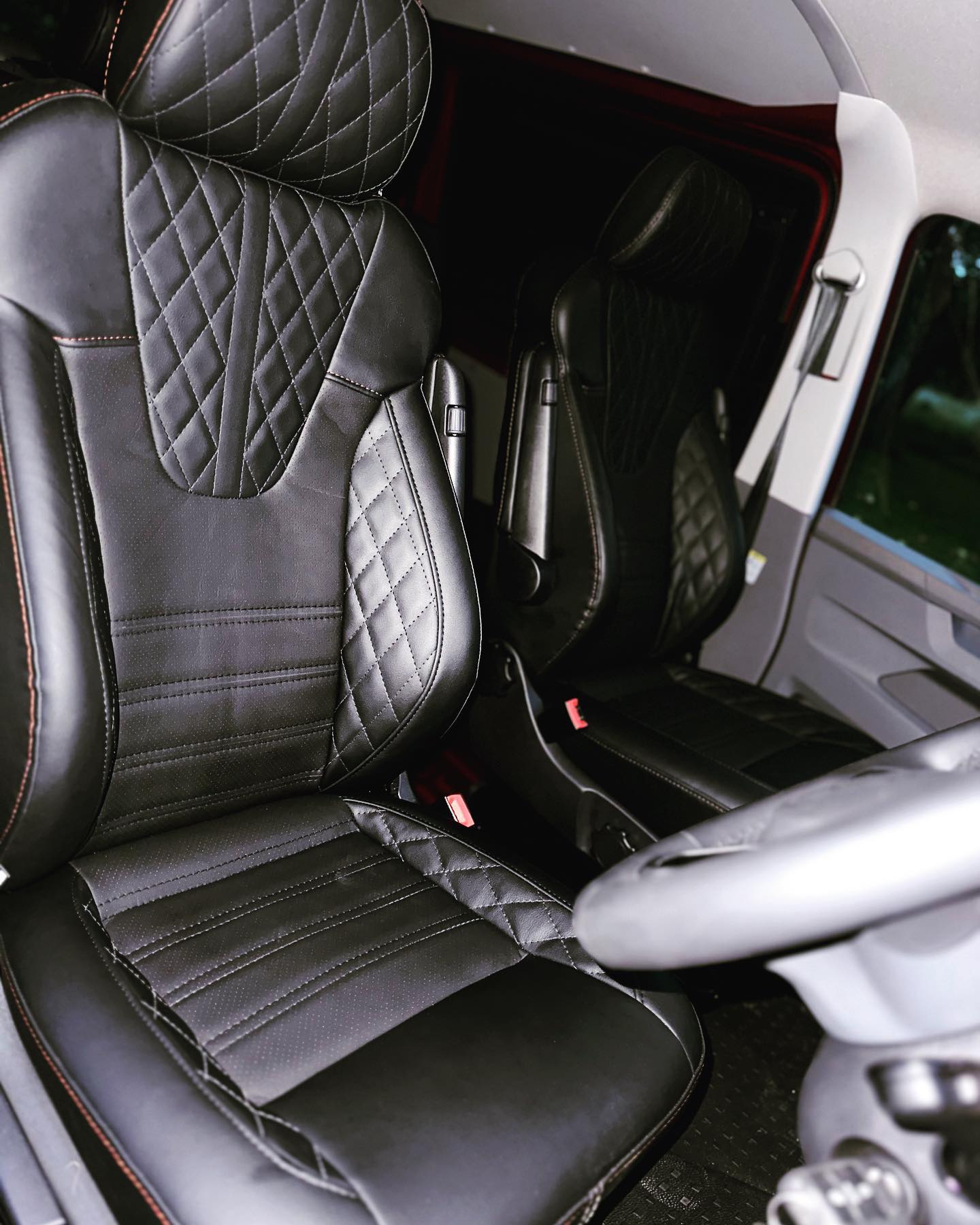 Van Up VWT6 sport foam upgrade. Classic black with perforated insert and bespoke red stitch detail to match van paint colour.