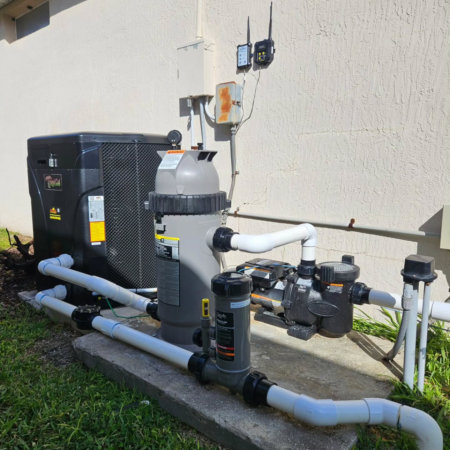 Complete equipment upgrade at this home. Variable Speed Pump, Filter Housing, Chlorinator, and Pool Light. Bundled with a 3 year part & labor warranty.
We replaced the Heat Pump too of course, with an industry leading 5 years labor, 7 year parts warranty. 
Both the Variable Speed Pump & the Heat Pump are WiFi connected, to  be controlled from anywhere in the world with internet access. 
A Variable speed pump can be programmed to operate for as little as $0.40 per day. That's only $153.00 per year to keep your pool filtered!