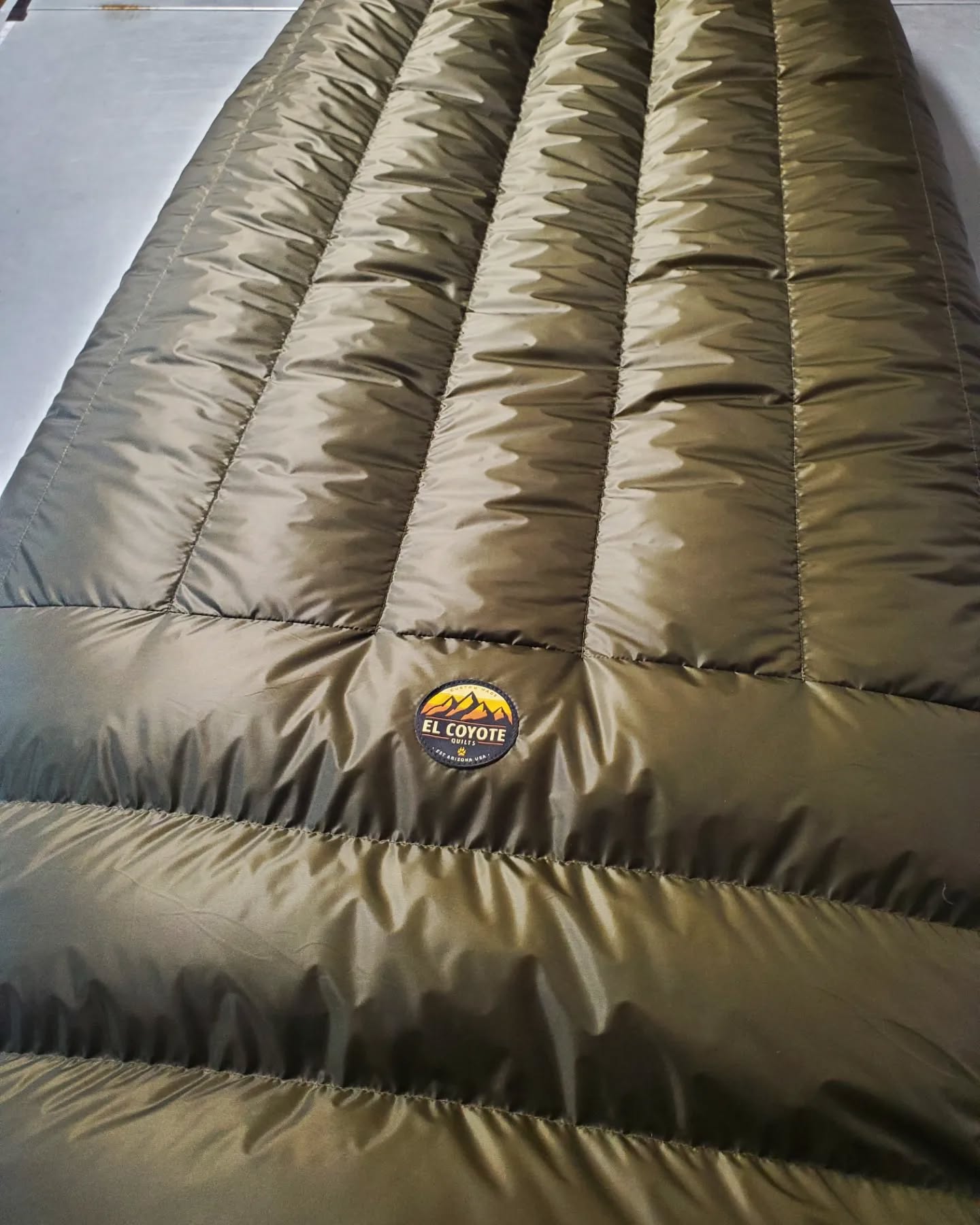 One of our larger/warmer quilts.Made for one of our hunting customers, this custom made, Tall/XX-Wide, 0 degree with 6 oz additional overfill is sure to be warm!
Thanks Brian, be safe in the backcountry.
Always Handmade in USA 🇺🇸