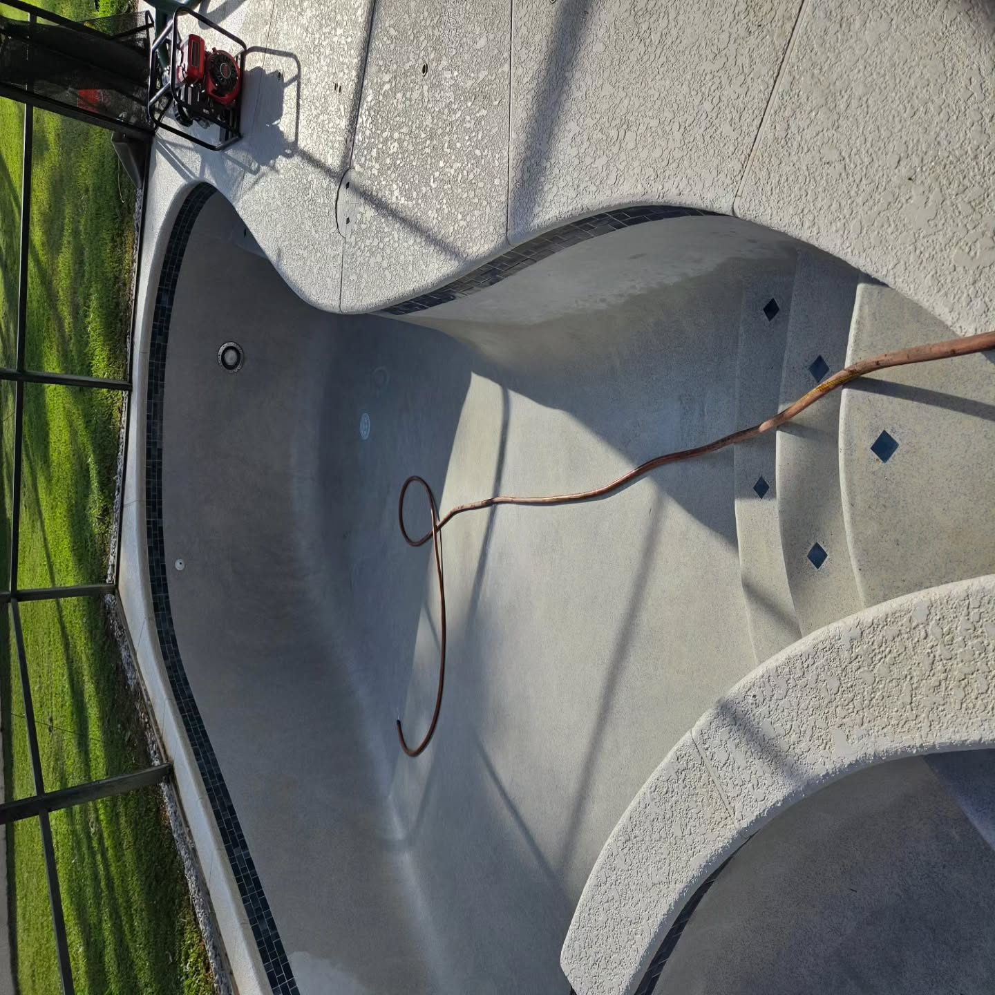 Reclaimed irrigation pipe burst and was pumping directly into this pool through the weekend. Drain & Clean on this pool we just resurfaced last month. Light acid wash to remove some minor staining from the sand.