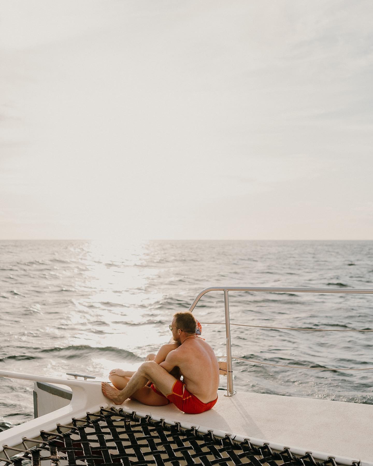 As they sail into their new life together, this bride and groom are joined by their cherished friends and family on a catamaran, making memories that will last a lifetime. ⛵💍