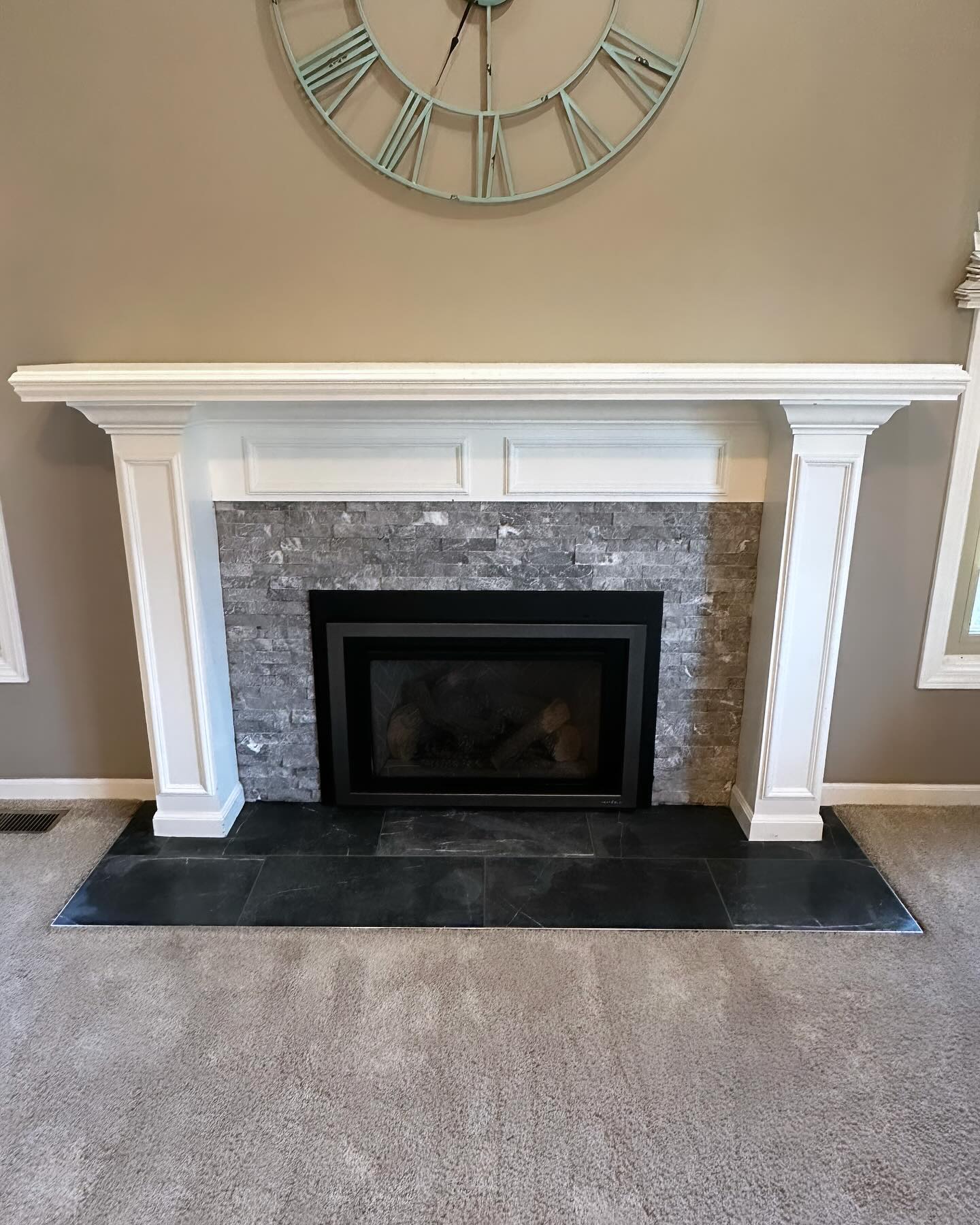 As usual, I forgot to take a photo before we tore out the original. But this is the final product!
#stskcedstone #tile #fireplace #stone #subwaytile #fireplacetile #kimbletile #remodel #home