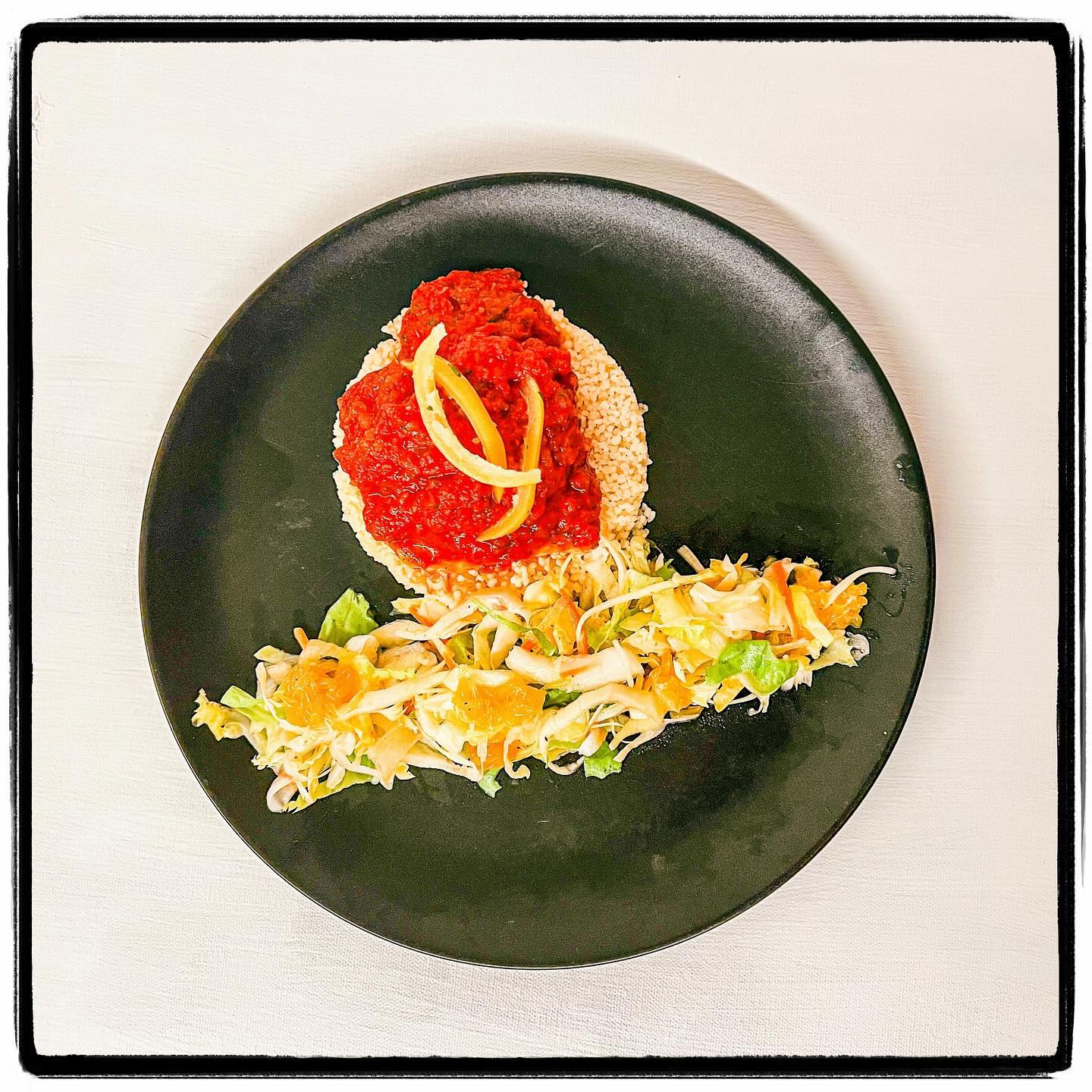 Main course - Cod with couscous in G Minor. Cooked with chermoula in Passata and served with a fresh salad. Click the profile to see all the recipes and wine parings.