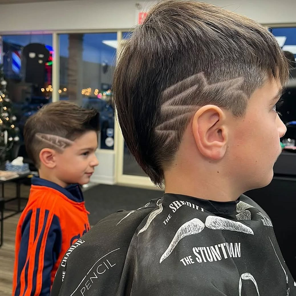 A couple great haircuts by our talented barber Drake