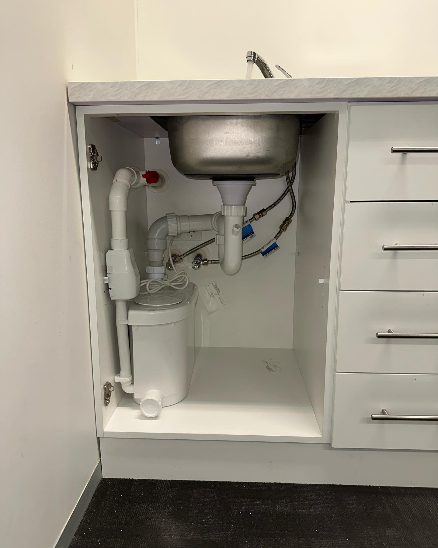 Client wanted a sink in the middle of no where, lucky we have solution for there problems #undersinkpump #pump #reece #reeceplumbing #plumbersydney