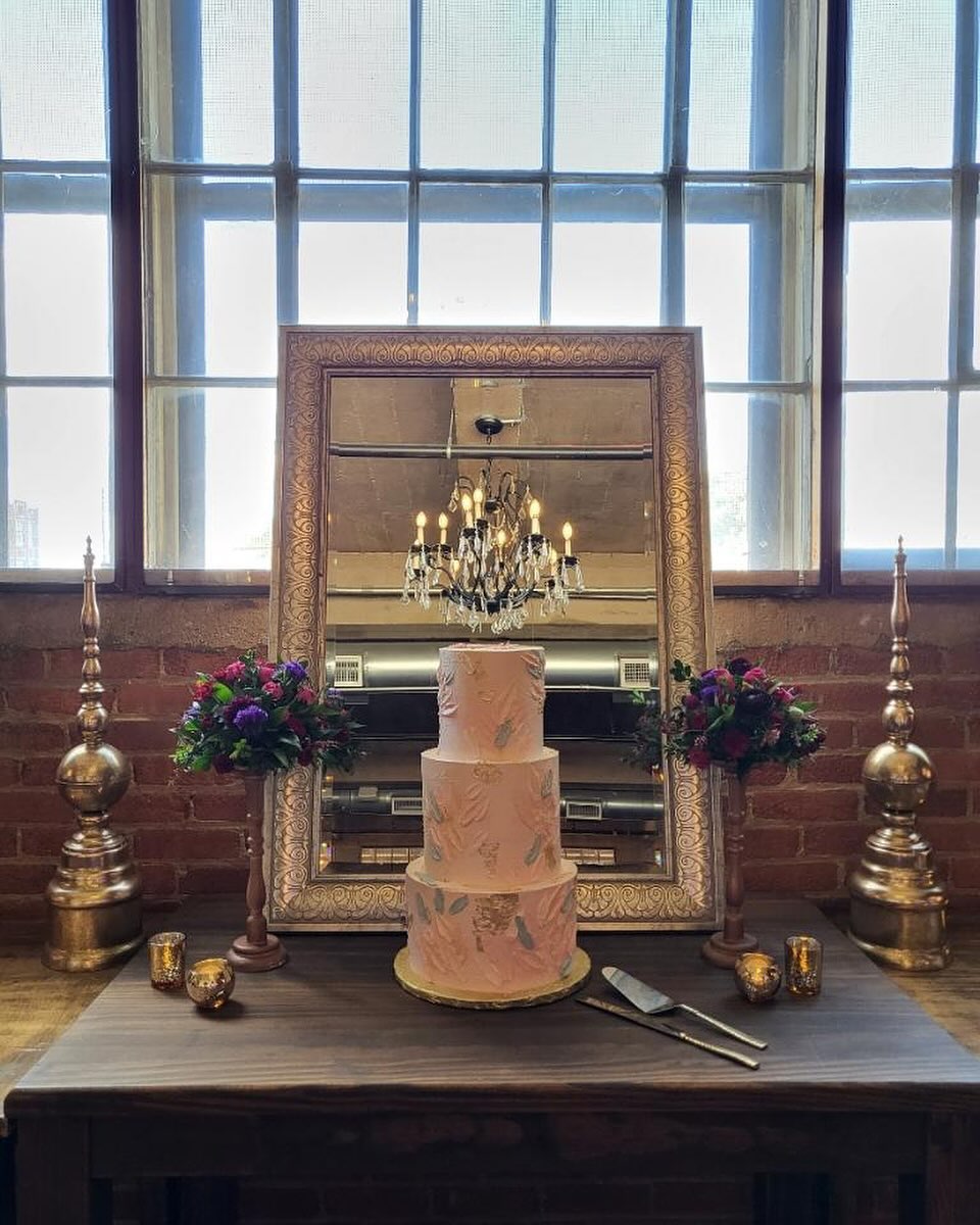 A cake and setup as beautiful as the bride.