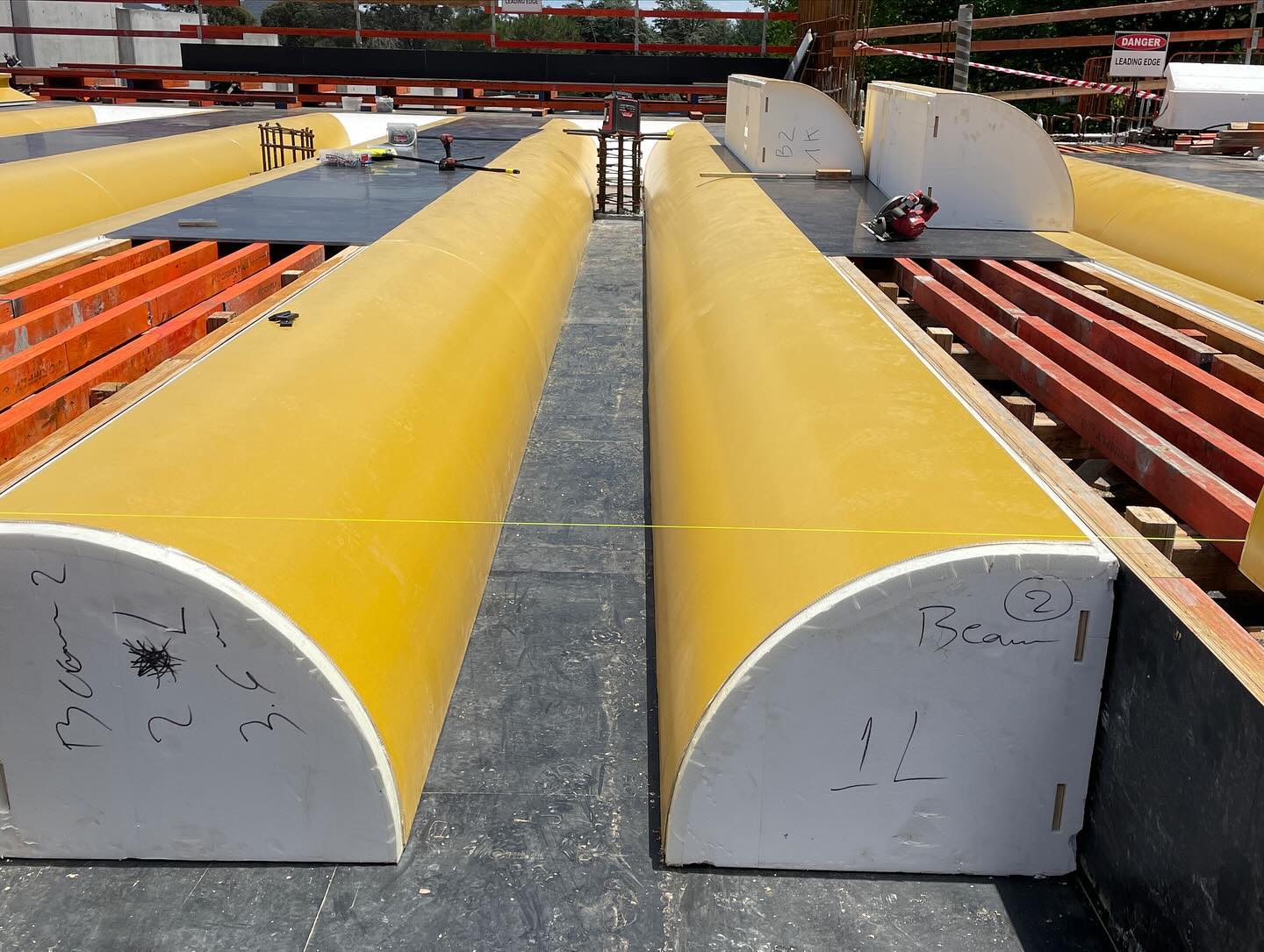 Bespoke formwork supplies custom shaped radius beam moulds for major Canberra project.. can’t wait to see the finished concrete soffits. #bespokeformwork #architecturalconcrete #customshapedconcrete #formworkmoulds #canberraconcrete #canberraformwork