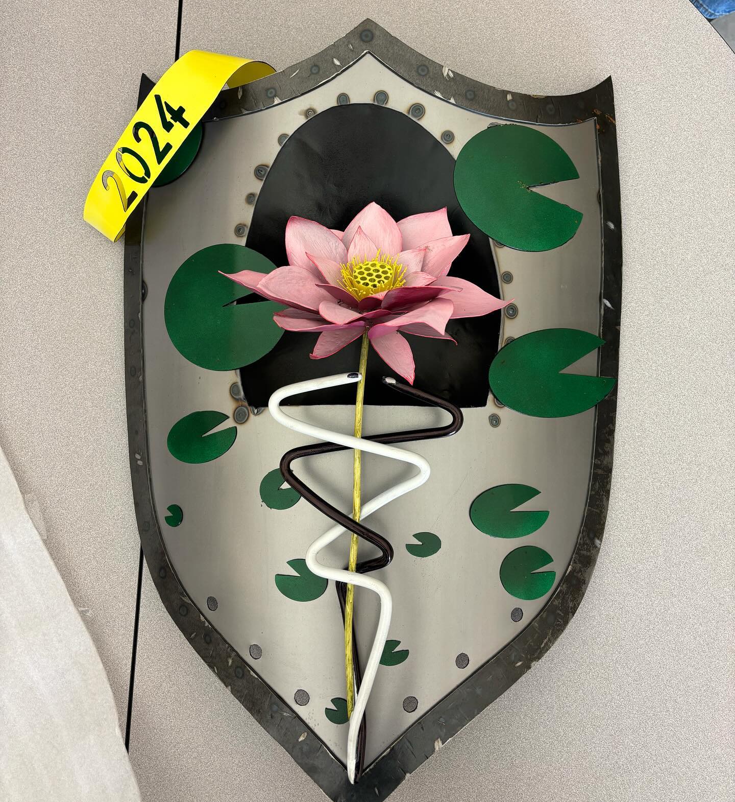 The Class of 2024 raised funds to have their shield, designed in 2021 by now senior Annie Marino, updated by our new shield artist @metalproper. Today the finished product was revealed! A wonderful shield for a wonderful class.