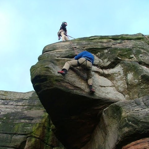 Climbing on Birchen Edge in the Dark Peak District