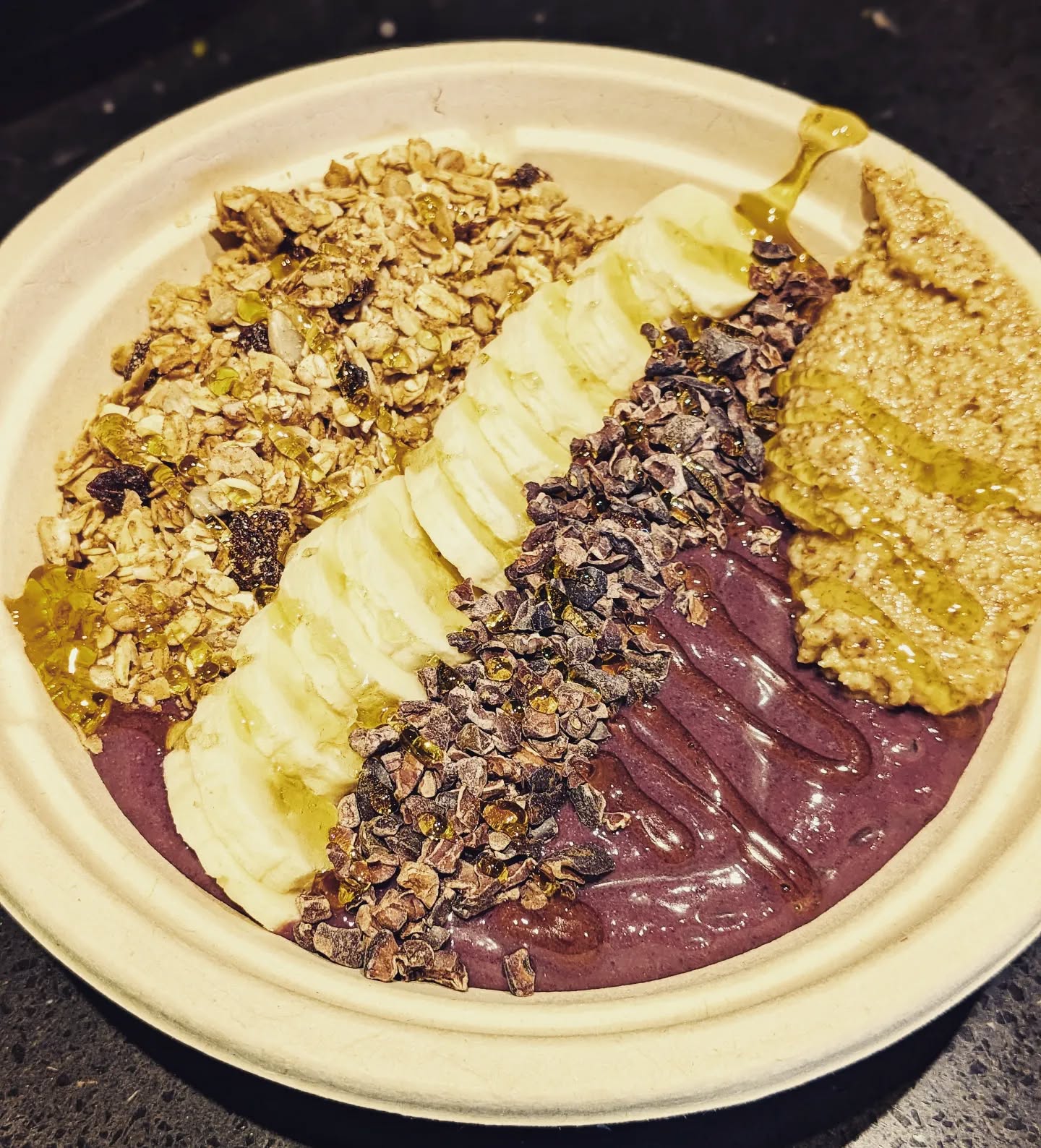 The Contest Bowl. Granola-y, banana-y, cacao nibby, almond butter-y, oozy honey goodness 🤤