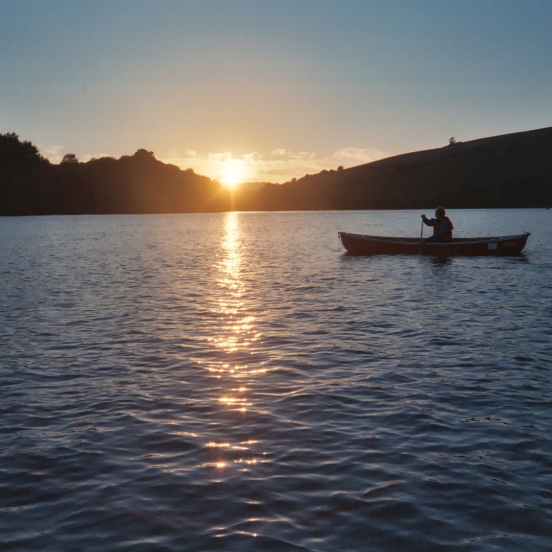 Canoeing at sunset on the River Dart Estuary