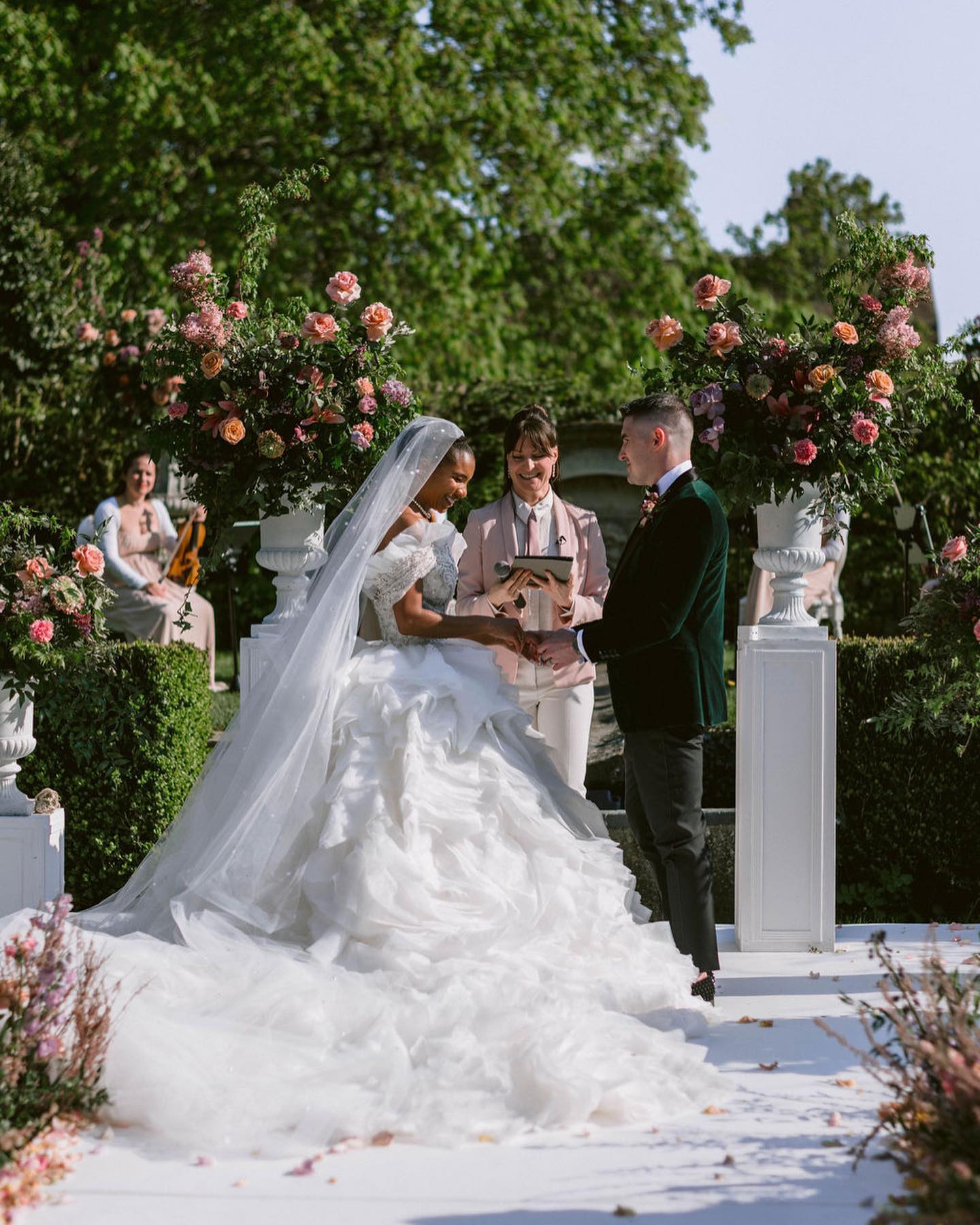 🌟👑Can I hear a little commotion for the dress?
Danae’s custom gown by @eseazenabor was nothing short a true masterpiece fit for a queen that left us in awe. Every stitch, every detail, radiated opulence and glamour.
It did take a small village to get it where it needed to be, and that’s how teamwork makes such a difference on a wedding day. Even getting it to France was it’s own adventure.
So here is the dress in all its glory, stay tuned for the evening version of the dress.
Venue: @chateaudevallery
Photo: @gregfinck
Video: @zenfilmworks
Planning, design and production: @bonjourweddings.fr
Assistant coordinators: @charlotte_adt @joelleantounevents
Wedding dress: @eseazenabor
Pre and post wedding dresses: @rimearodaky
Groom’s attire: @dior @louboutinworld
Florals: @botaniquebazar
Paper goods: @emilybairddesign
Hair: @ciaracoiffure
Makeup: @beautybymaeva
Catering: @domainedesjardins
Cake: @syniesparis
Couscous: @l.oasis.orientale.paris
Officiant: @theparisofficiant
Live music: @ivana.string.quartet
DJ: @selecktive.official
Live painter: @eventillustrator
Rentals: @atawaevent @maison_options @velvetrendezvous
@options_orleans
Technics and production: @bounz.events
Content creation: @goldy.house
Aerialist: @cara.chapman.aerial
Fire show: @supercho_show
Fireworks: @cduval77890
#OTMbride #DestinationWeddingPlanning #FrenchWedding #FrenchWeddingPlanner #ChateauChic #OverTheMoonWedding #DreamyDetails #RegencyRomance #LuxuryWeddingPlanning #DestinationIDo #BridgertonInspired #GregFinckPhotography #BridgertonWedding #EseAzenaborBride #RimeArodakyBabe #RimeArodaky #ParisWedding @drnaenae @advnturecaptlst @celiaetlesoleil