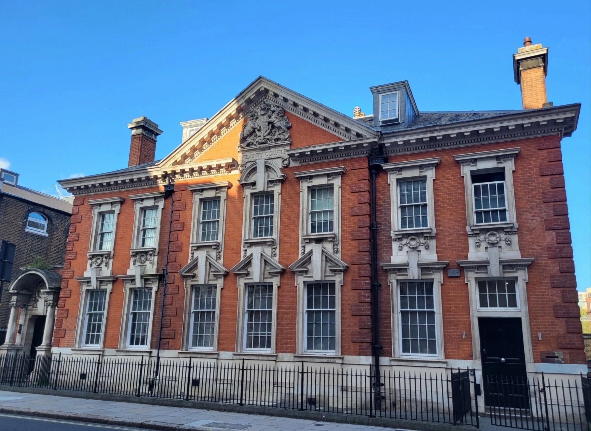 This Grade II-listed building is a masterpiece of English Baroque architecture. Its striking red brick and Portland stone facade, adorned with intricate carvings and a lion and unicorn crest on the pediment, makes it a landmark in the area.
The converted courthouse is a fascinating building with a rich history and plenty of character. Originally designed and built in 1908, the building served as the West London County Court for several decades before being converted into residential flats in 2011.
With its distinctive features meticulously preserved, we are proud to be a part of its legacy, and we're committed to protecting and enhancing its unique character for years to come.
#WestLondon #LondonProperty #LondonBlockManagement #HistoricBuilding #WestKensington #BlockManagementLondon #HistoricLondon