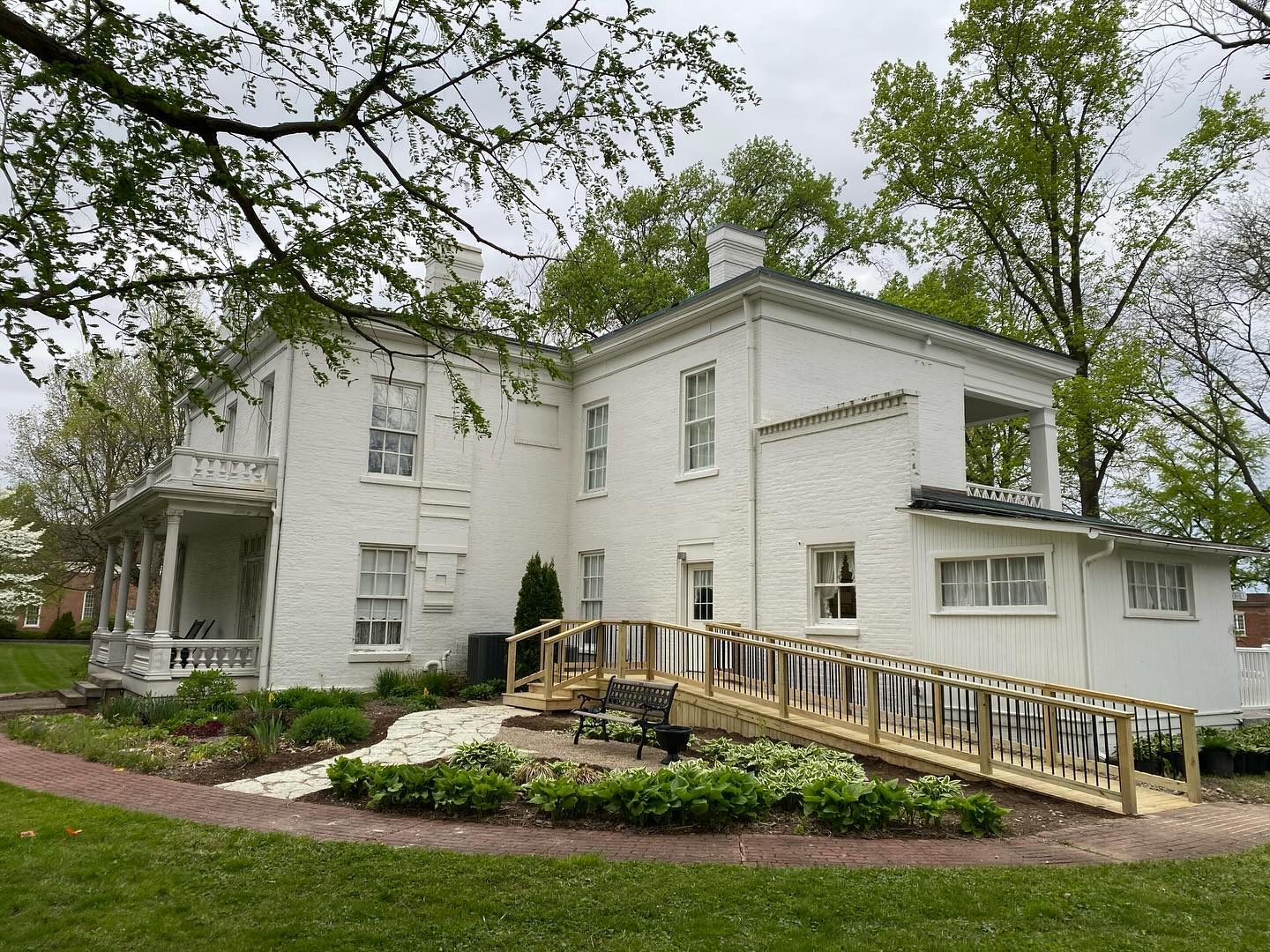 The ramp at Lane Place is completed! We are excited to have a safe pathway and ramp for guests with mobility limitations! While we are unable to be wheelchair accessible (due to level changes and doorway widths), this will go a long way towards welcoming many new guests to our historic home! Many thanks to @montgomerycocommunityfdn for helping this project become a reality and to @davidson_greenhouse_nursery for the beautiful work that was done! Next up is to work on our landscaping in the garden, so keep an eye out for some gorgeous color in our garden this spring and summer! #historichouse #uniquelymoco #crawfordsville #laneplace #accessibility
