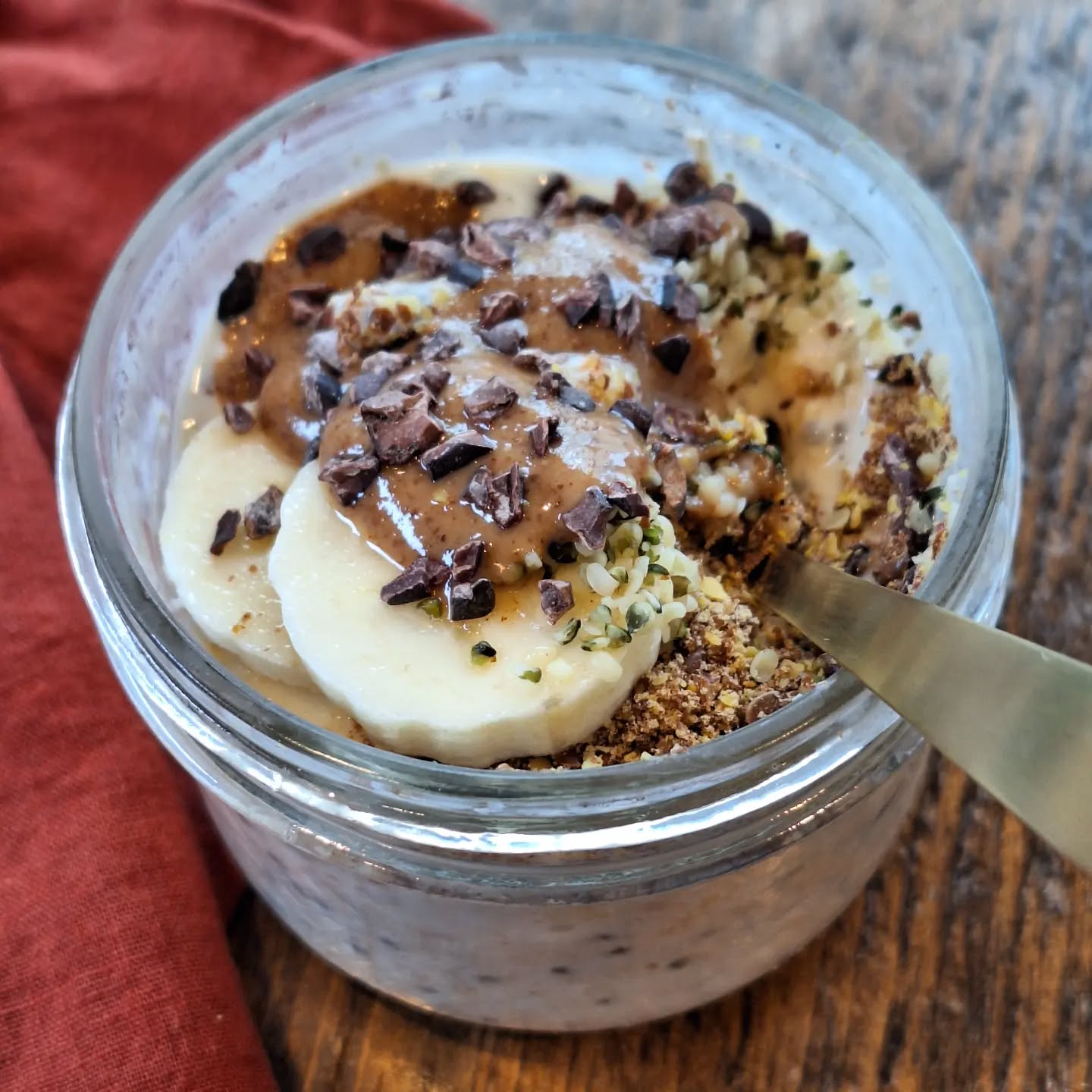 Almond butter, banana, and chocolate overnight oats: I soaked oats overnight with chia seeds, plain kefir, almonds milk and a dash of maple syrup. Topped with a drizzle of almond butter, banana, hemp hearts, cacao nibs and ground flaxseed.