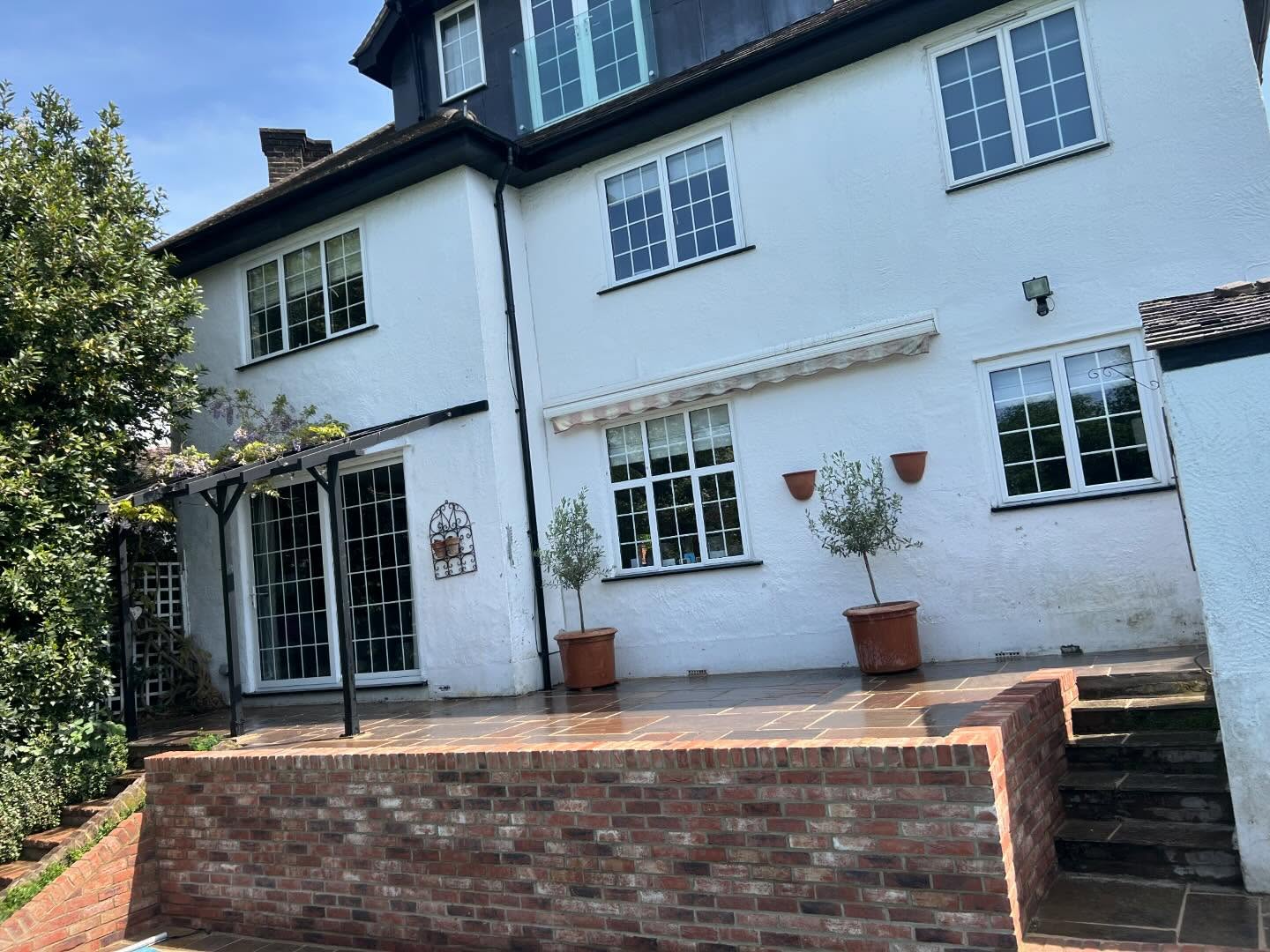 New walling with sandstone patio (Raj)