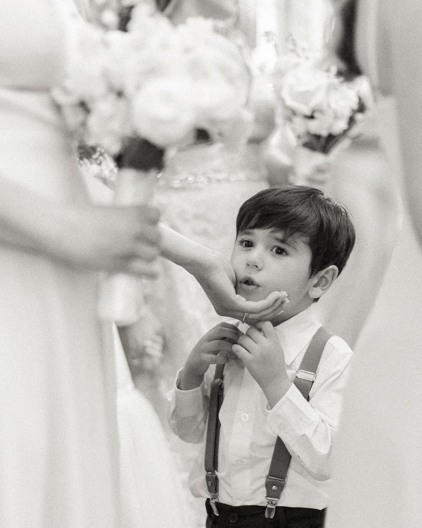 The special in-between moments during the wedding day are some of my favorite to catch on camera. Candid photographs complete the story of your special day and reveal the authentic memories that may otherwise go unnoticed. Some moments before the walk down the aisle in black and white on A&N’s special day.