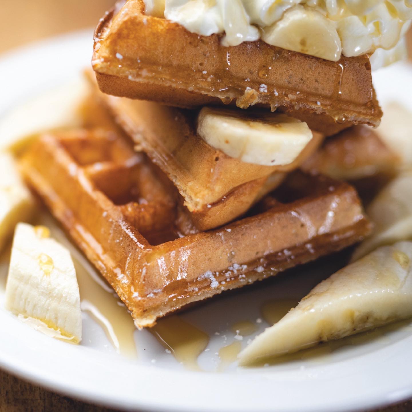 Kickstart your brunch with our homemade banana waffles! 🍌🧇✨ Fluffy, flavorful, and topped with the freshest ingredients. #BrunchCafe #BananaWaffles #HomemadeGoodness #BrunchLovers